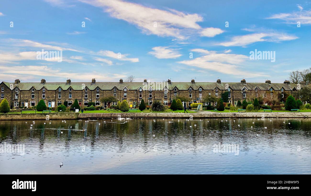 A row of terraced houses on the bank of the River Wharfe, Otley, Yorkshire. Stock Photo