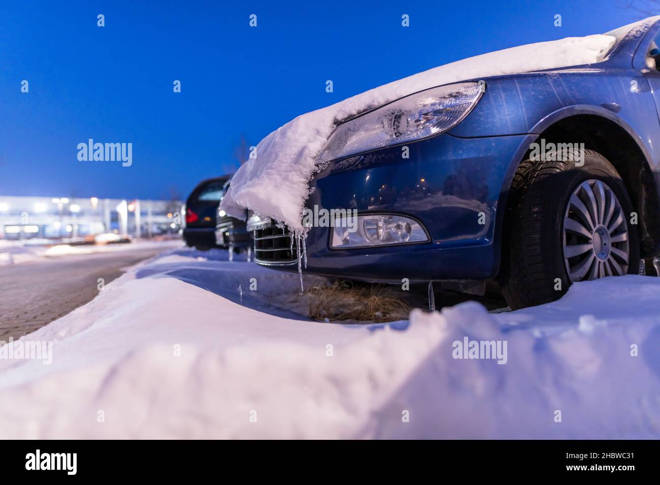 Cars covered with snow on a parking lot Stock Photo - Alamy