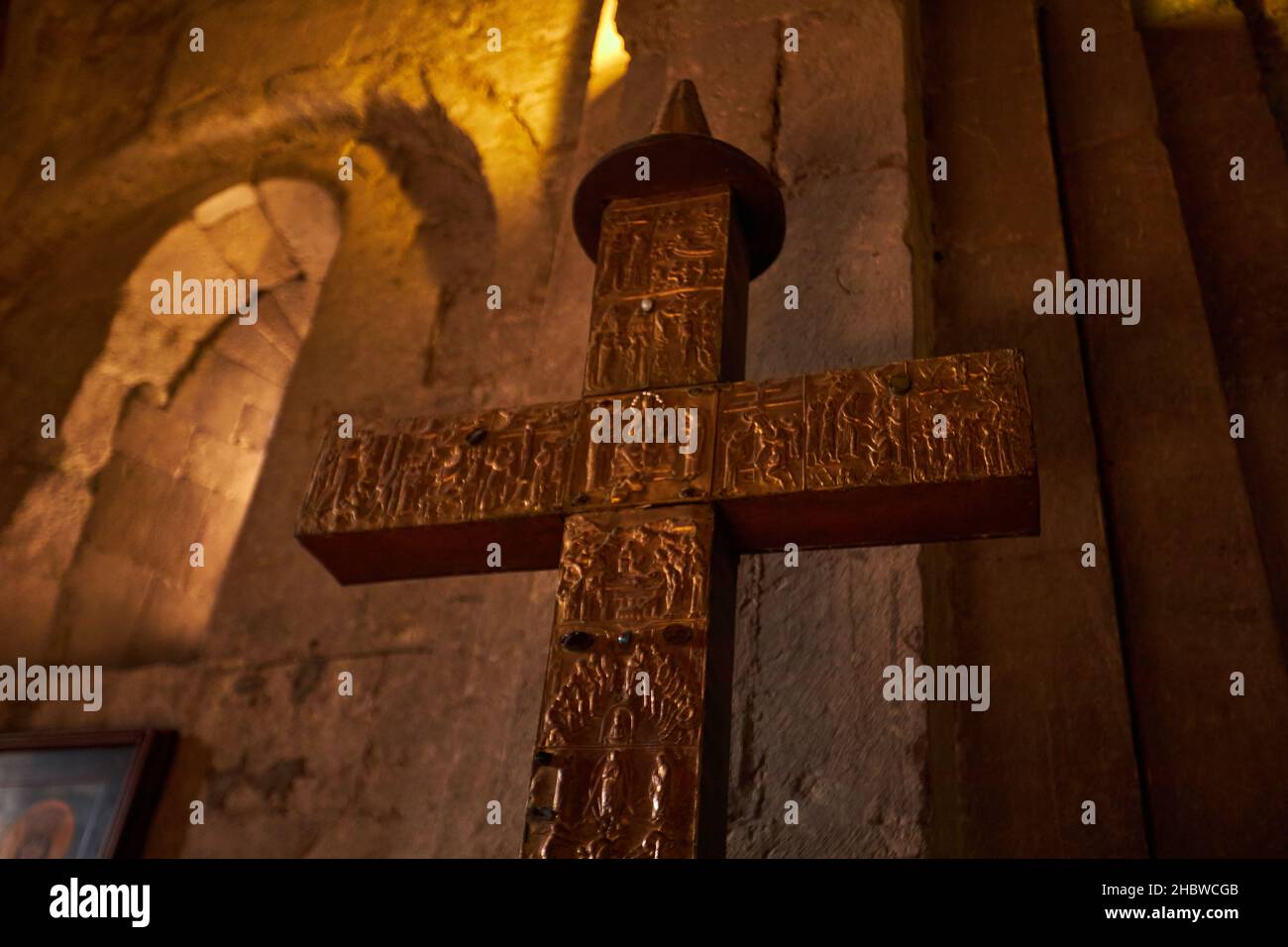Inside of Svetitskhoveli Cathedral. Stone walls and frescoes of walls. Old balcony and impressive picture Stock Photo