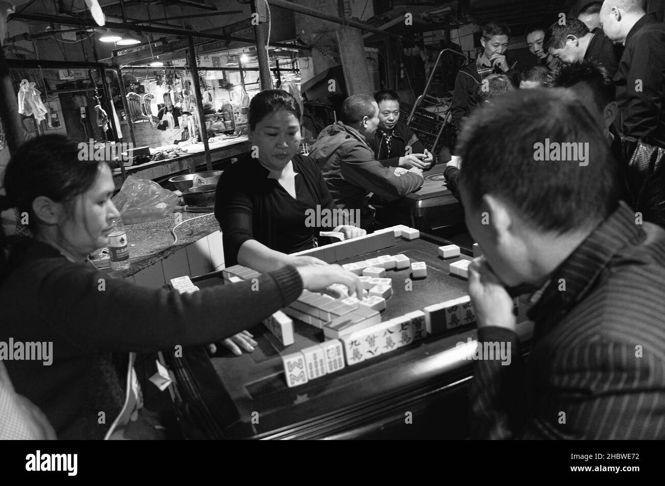 Group of people playing Mahjong. Chongqing market.. China 2019 Stock Photo