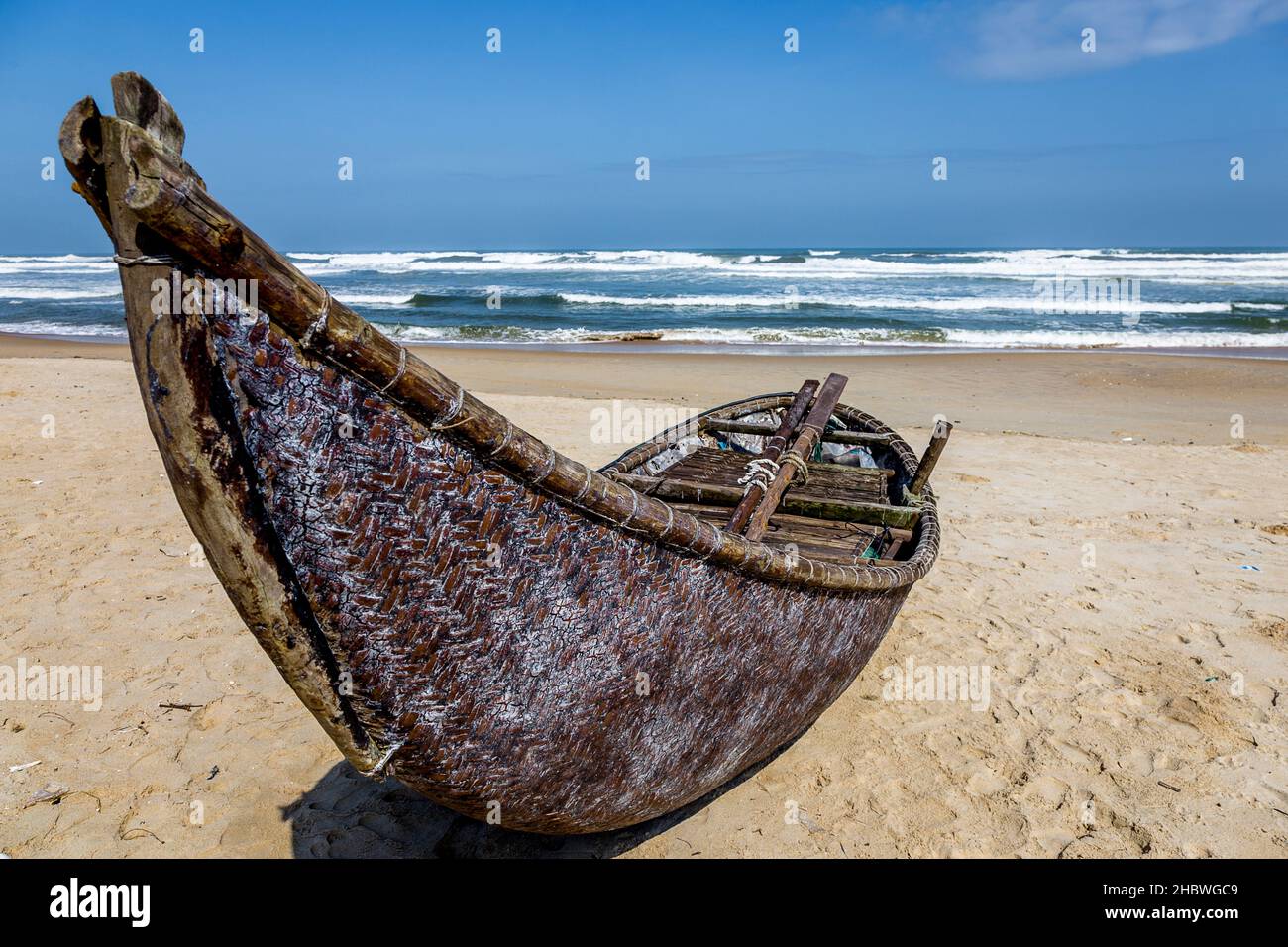 one fishing boat pulled up on the beach at Tam Ky, Tam Thanh. Stock Photo
