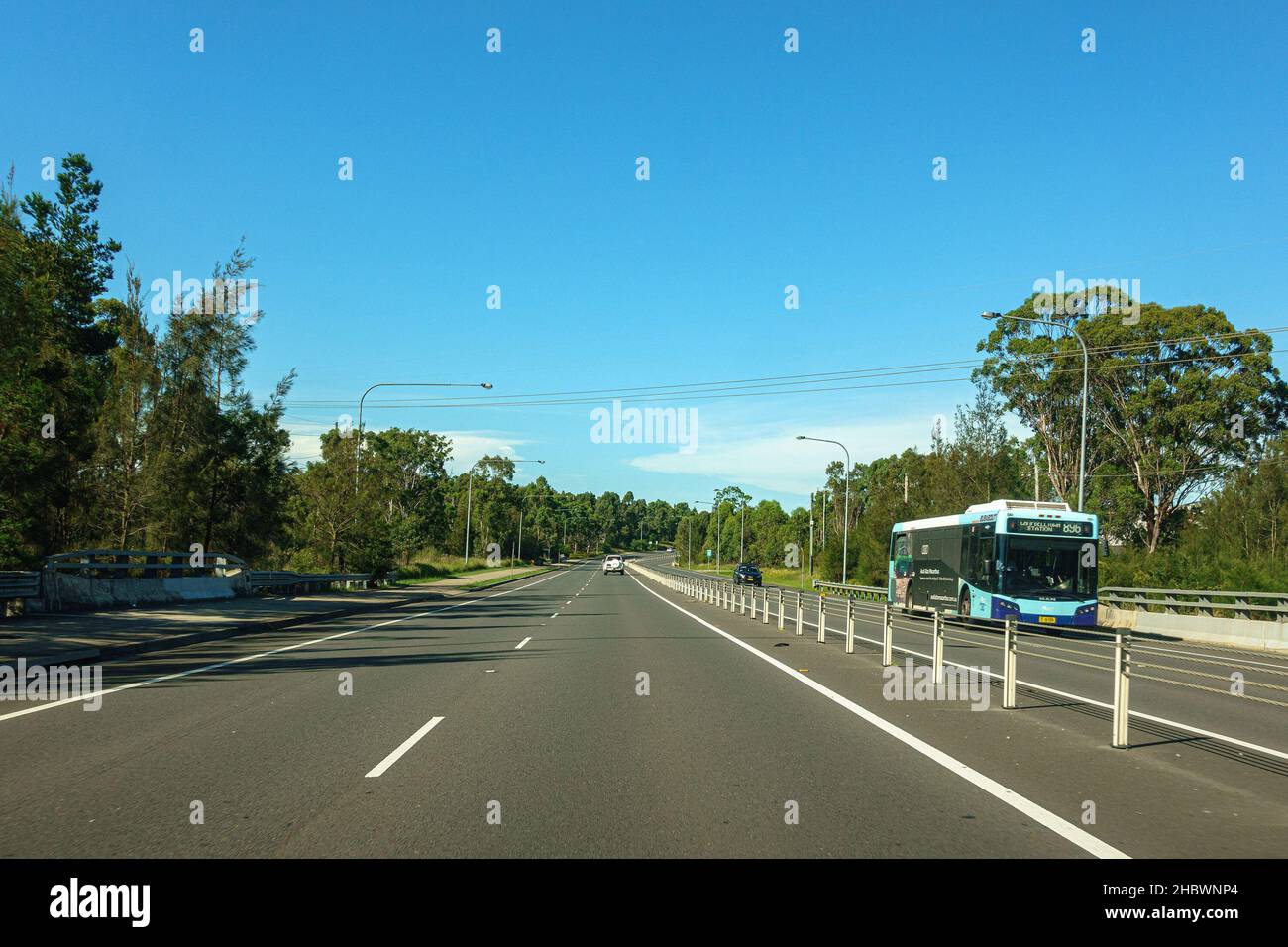 Camden Valley Way in Smeaton Grange on a summer afternoon in the