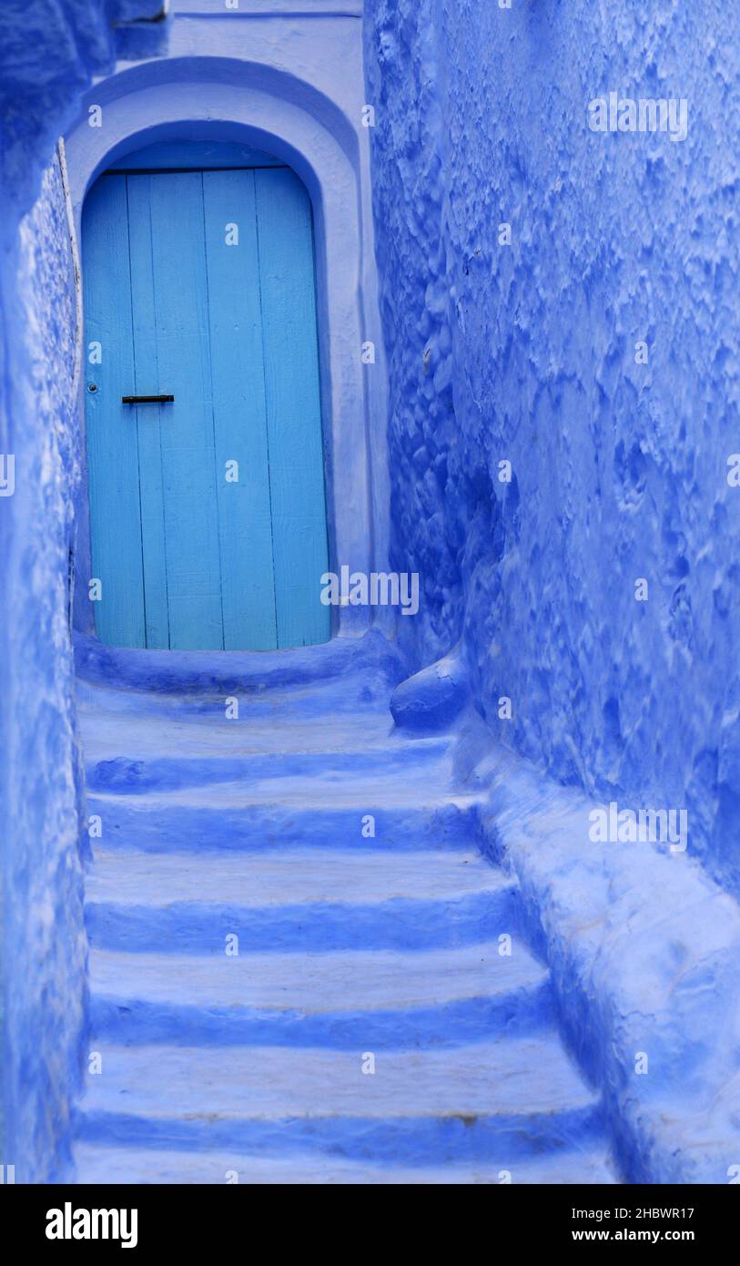 A traditional door in a small building in the medina of Chefchaouen, Morocco. Stock Photo
