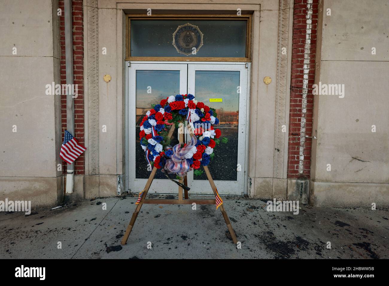 MAYFIELD, KENTUCKY - DECEMBER 20:  POWMIA wreath place at the entrance to the tornado damaged American Legion building, on December 20, 2021 in Mayfield, Kentucky.  Multiple nighttime tornadoes struck several Midwest states on December 10, causing widespread destruction and multiple casualties. Stock Photo