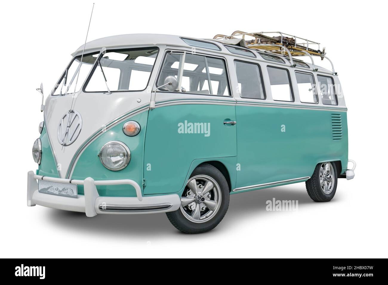 Illustrative editorial side view of a  historic volkswagen van with baggage rack. Stock Photo