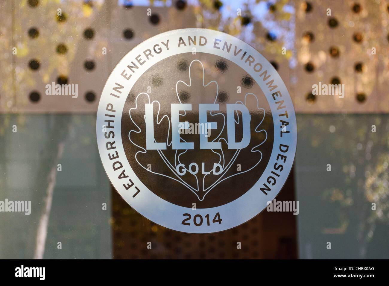 LEED Gold level certification sign. Leadership in Energy and Environmental Design, LEED, is a green building certification program used worldwide - Sa Stock Photo
