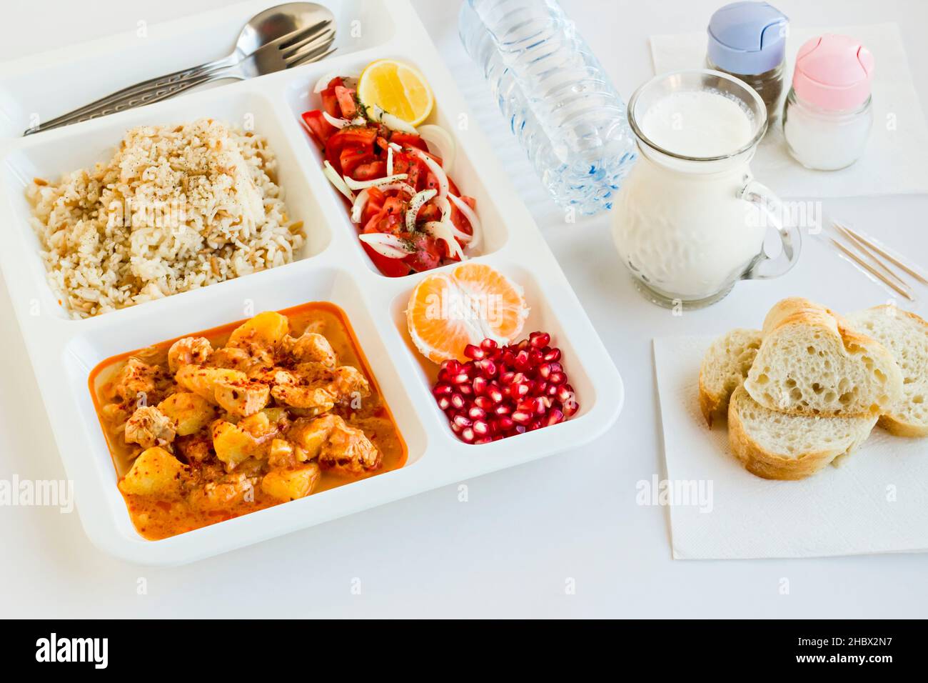 Traditional Turkish Meal with chicken potato,rice,tomato salad and