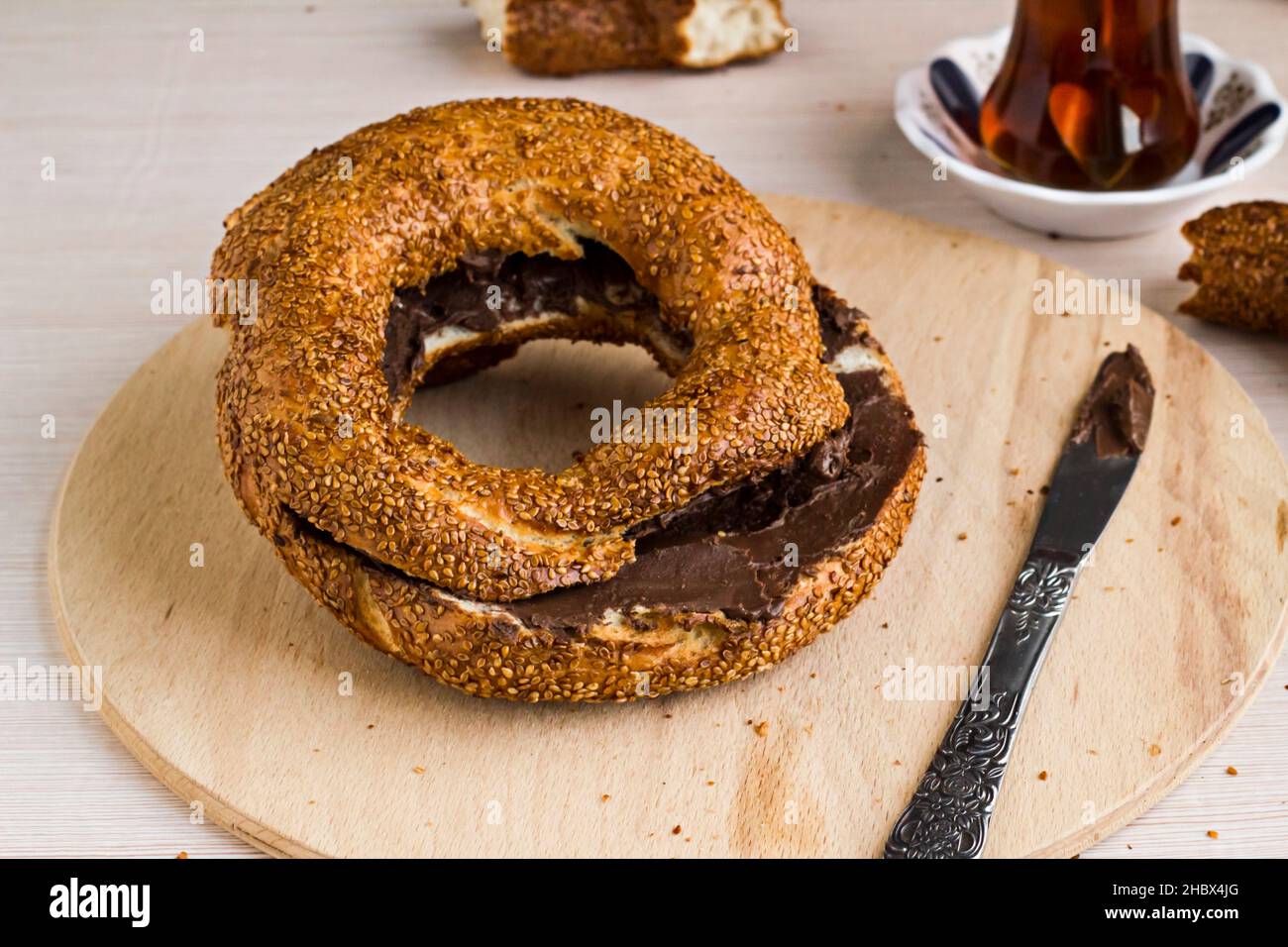 Traditional Turkish crispy bagel,simit with cream chocolate on the ...