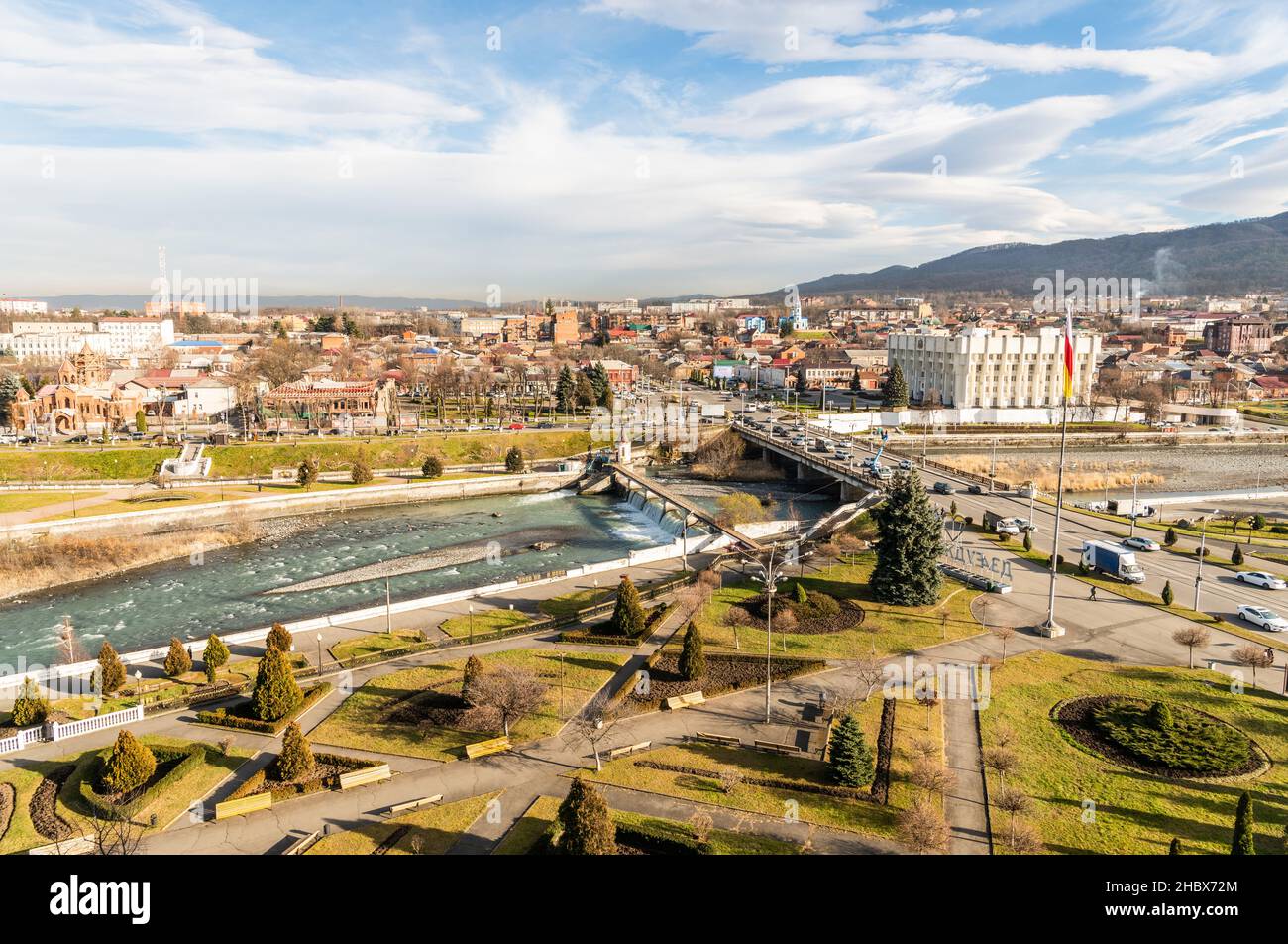 Vladikavkaz, Russia – December 15, 2021. View over Vladikavkaz, the capital of North Ossetian republic in Russia. The view incorporates Olga bridge, V Stock Photo