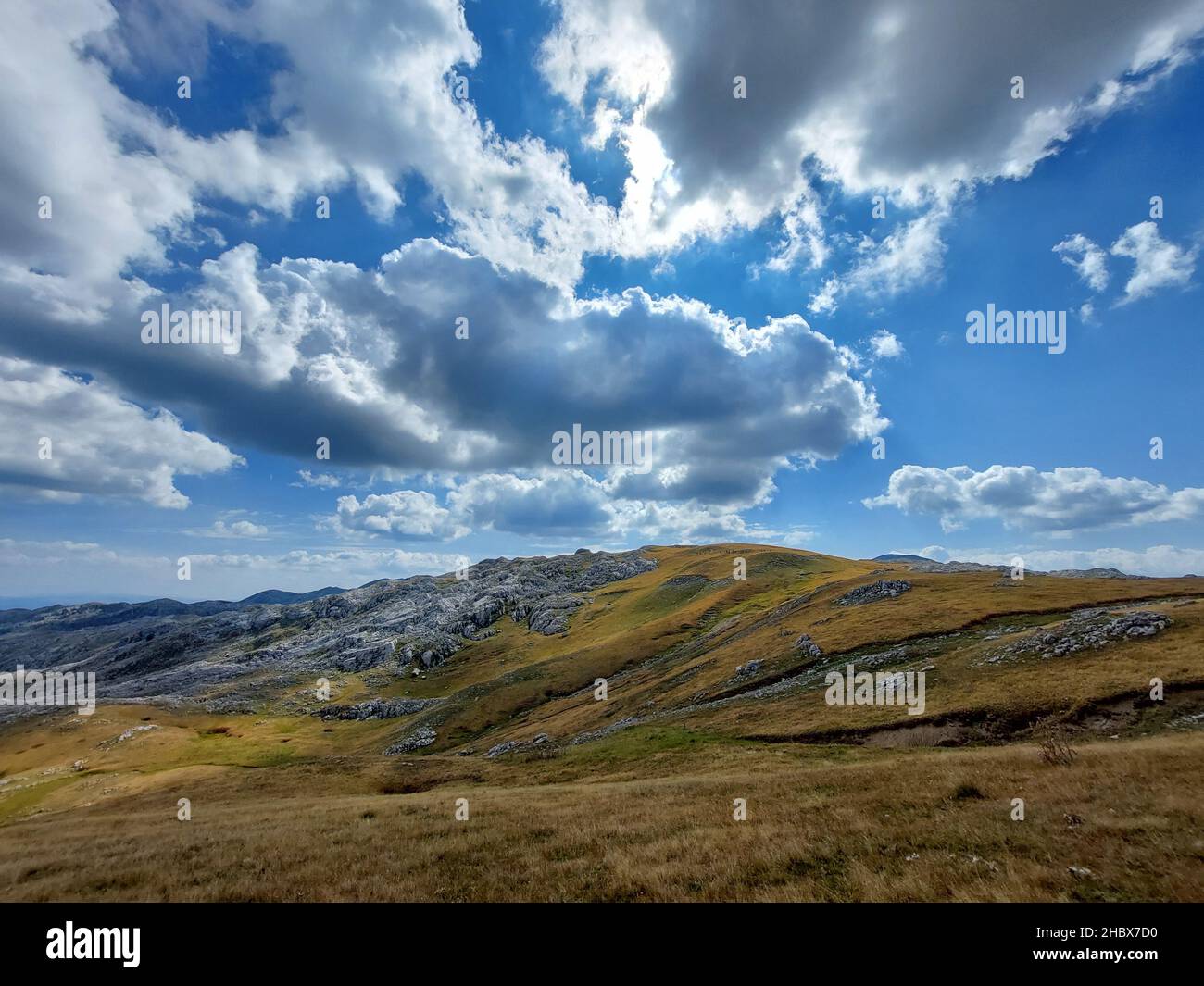 A scenery of hills under the cloudy sky Stock Photo - Alamy
