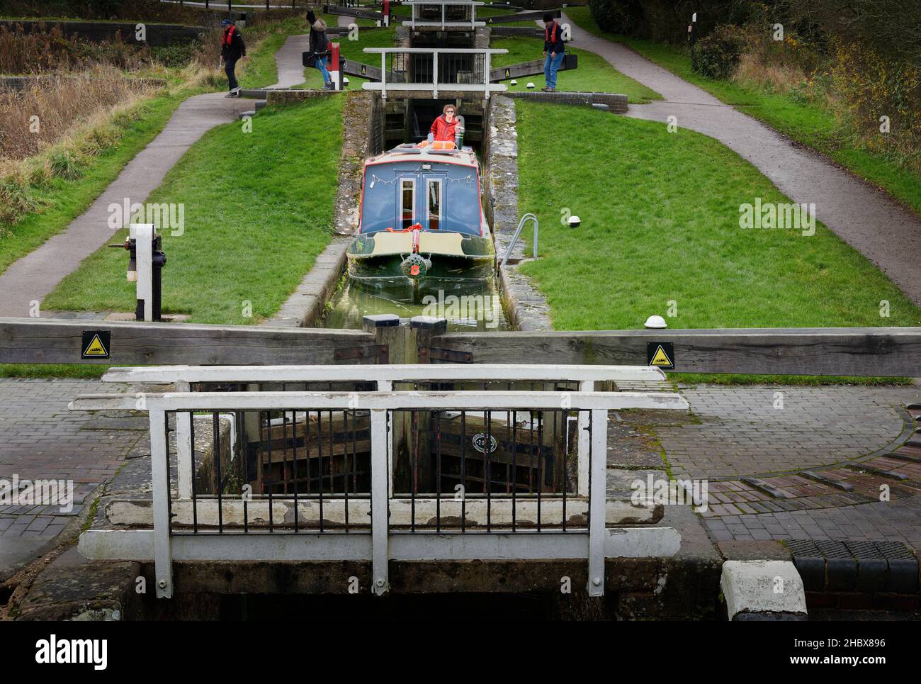 Narrow boat half way down the staircase of locks on the grand union canal at Foxton, England. Stock Photo