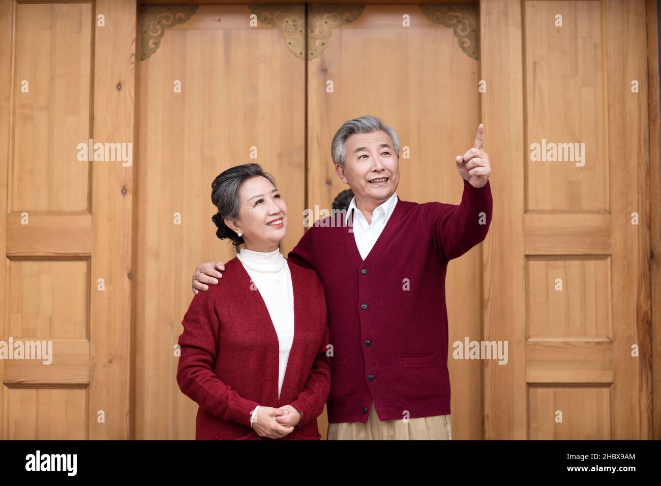 Happy old couple looking far away Stock Photo