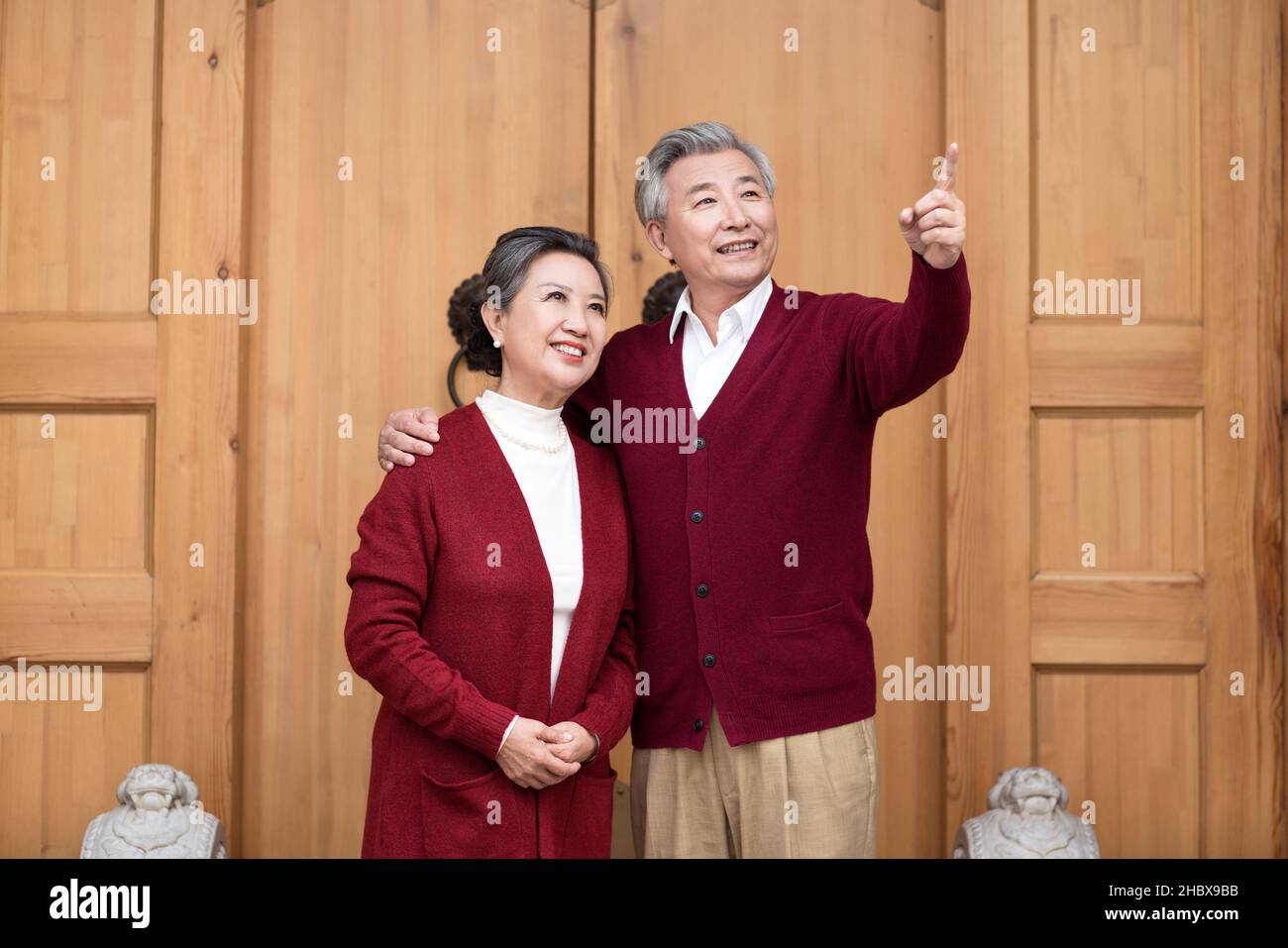 Happy old couple looking far away Stock Photo
