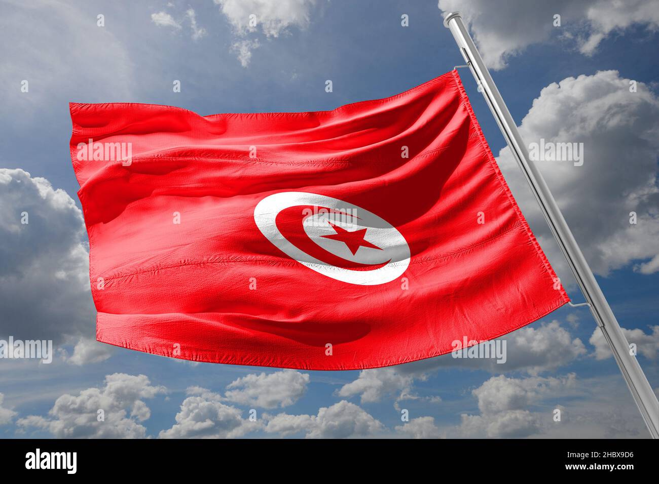 flag of tunisia waving in the wind Stock Photo