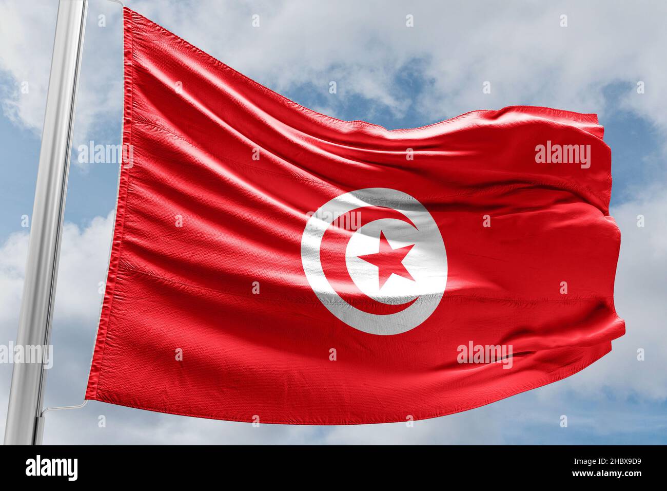 flag of tunisia waving in the wind Stock Photo