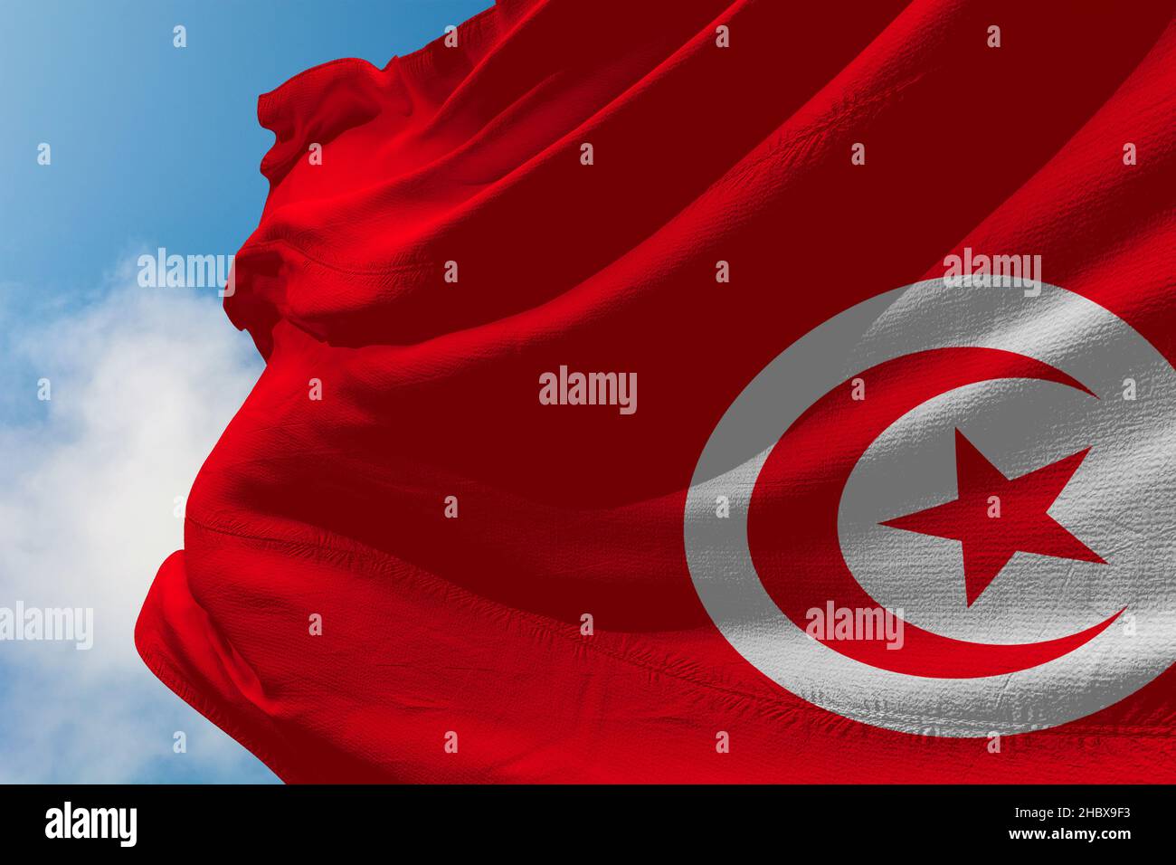 flag of tunisia waving in the wind Stock Photo