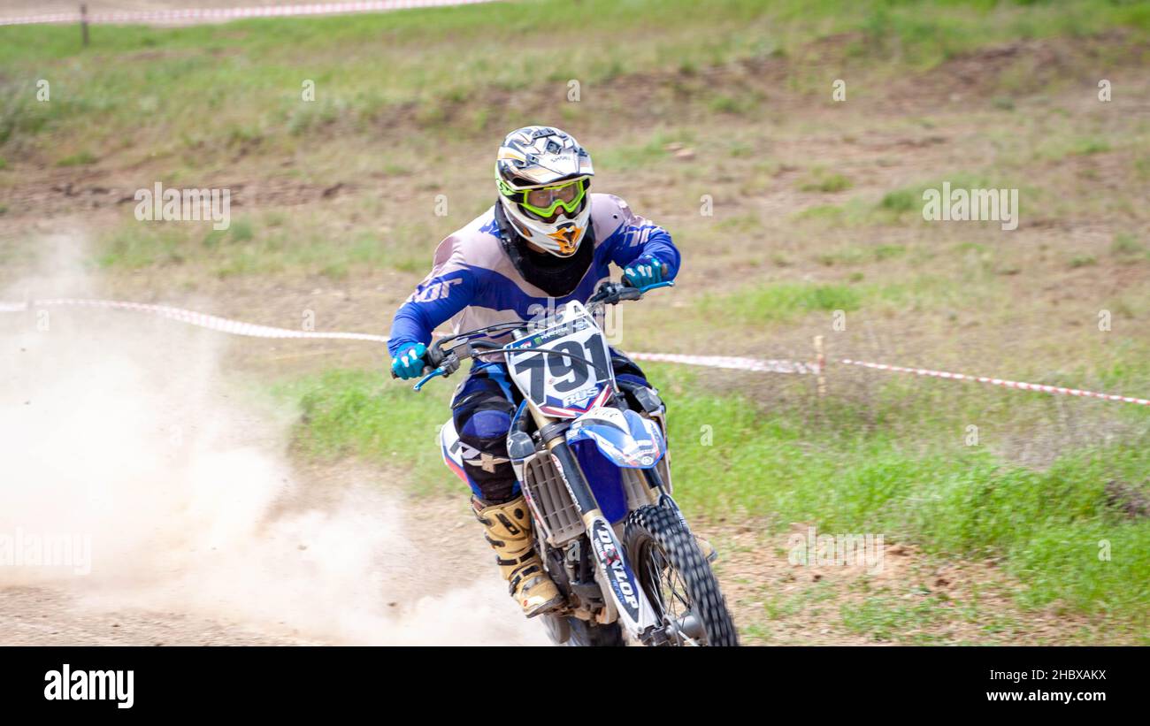 RUSSIA, Novoshakhtinsk - MAY 08, 2021: Motorcyclists ride sports cross-country motorcycles off-road Stock Photo