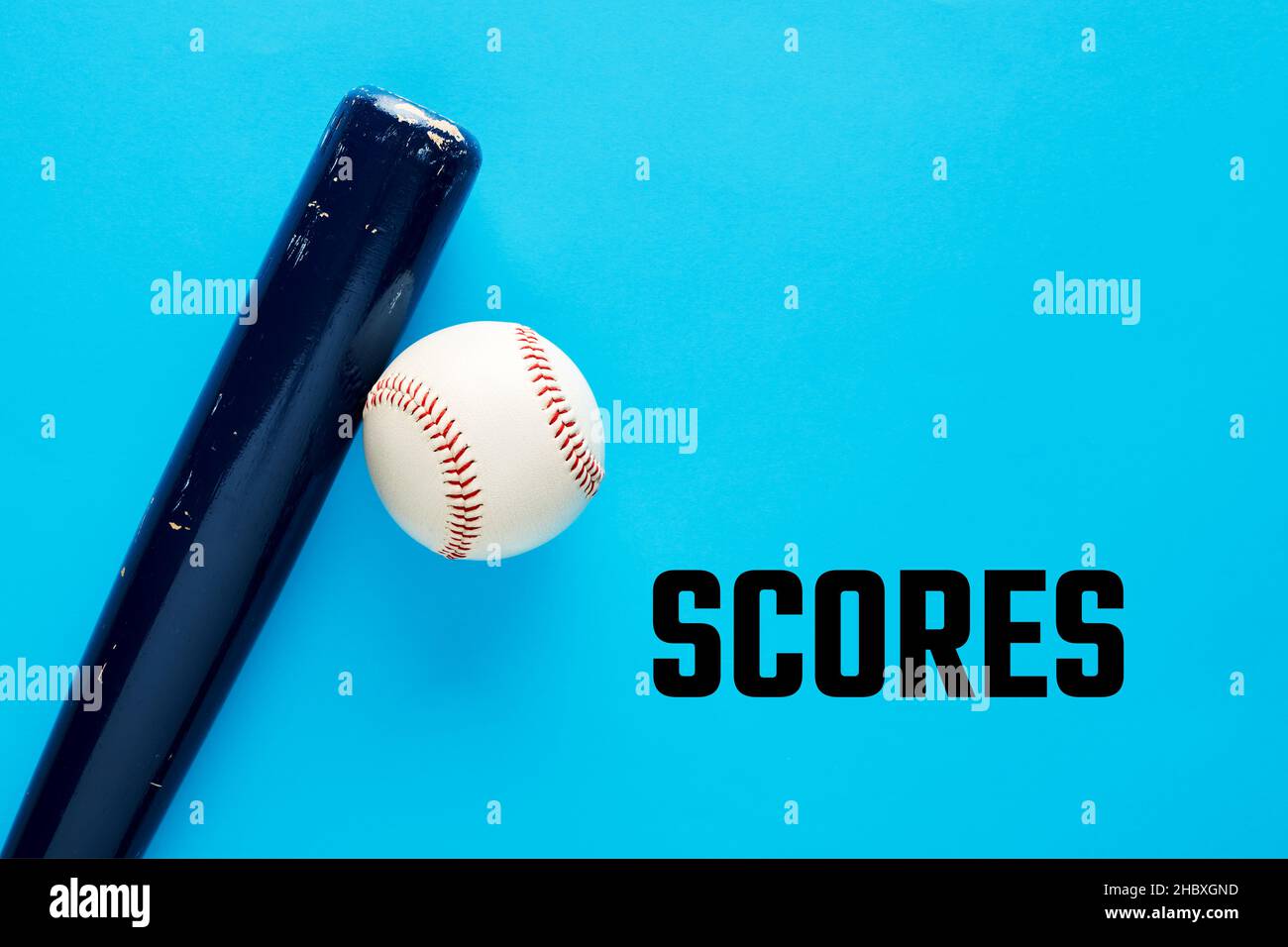 Baseball bat and a ball on blue background with the word scores