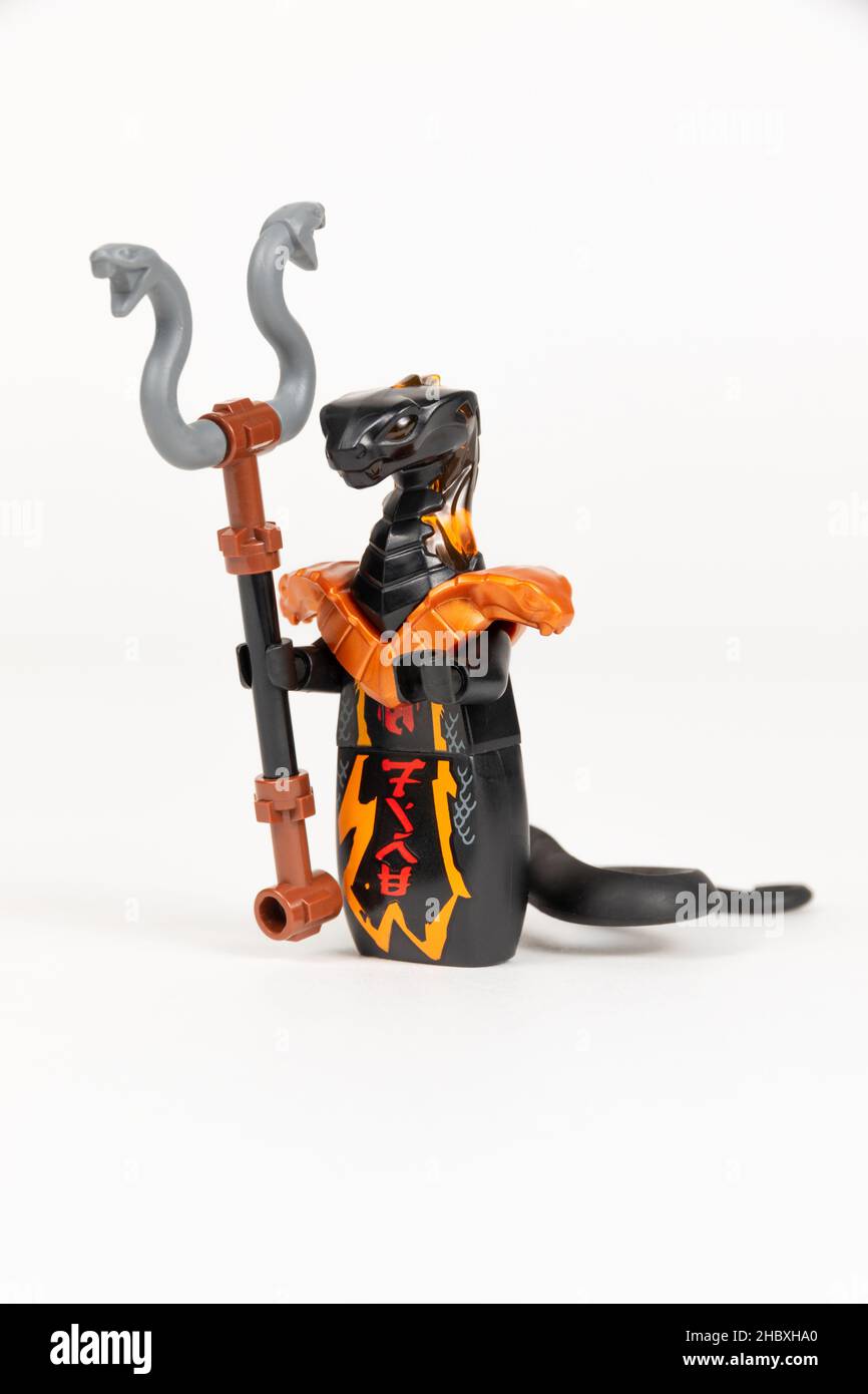 Yekaterinburg. Russia. 04.08.2021. Toy hero pyro slayer Char with the herald's wand from the Lego Ninjago set on a white background. close-up. selecti Stock Photo