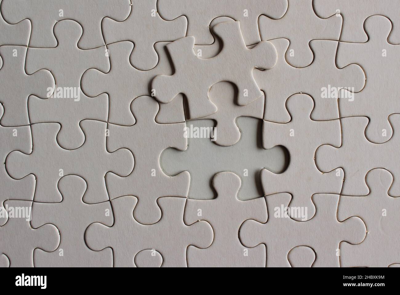 Close up image of blank white puzzle Stock Photo