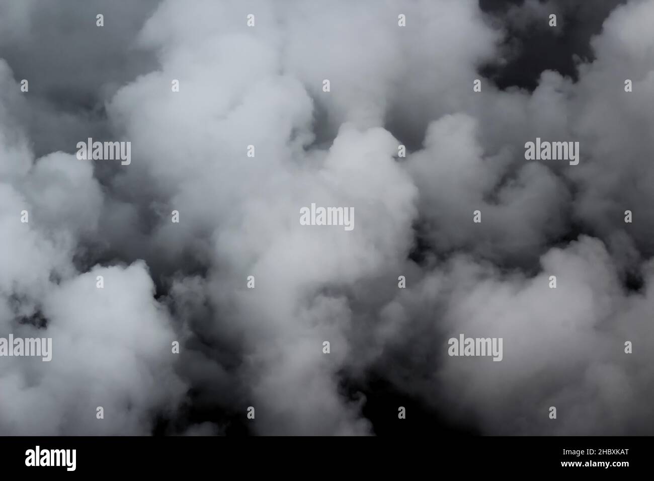White thick smoke on black background Stock Photo