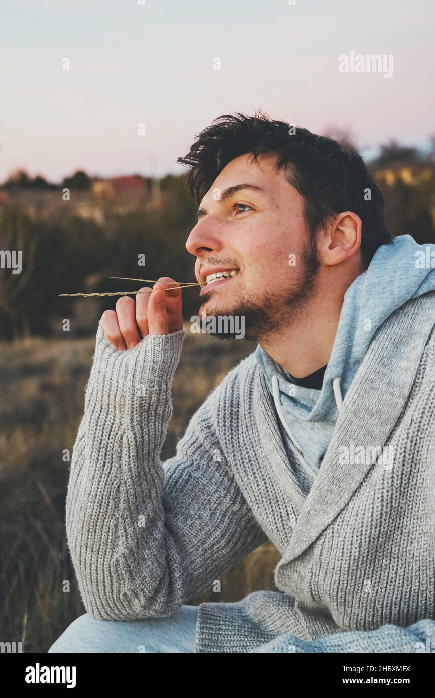 Delicate image of a young man touching nature Stock Photo Alamy