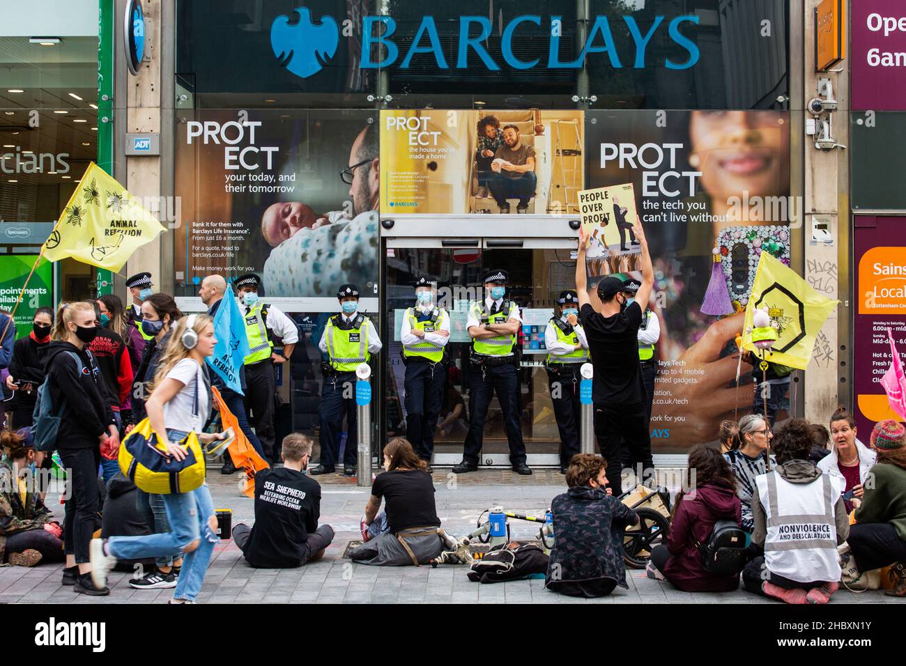Animal rebellion protestors with police outside Barclays Bank London 2020 Stock Photo