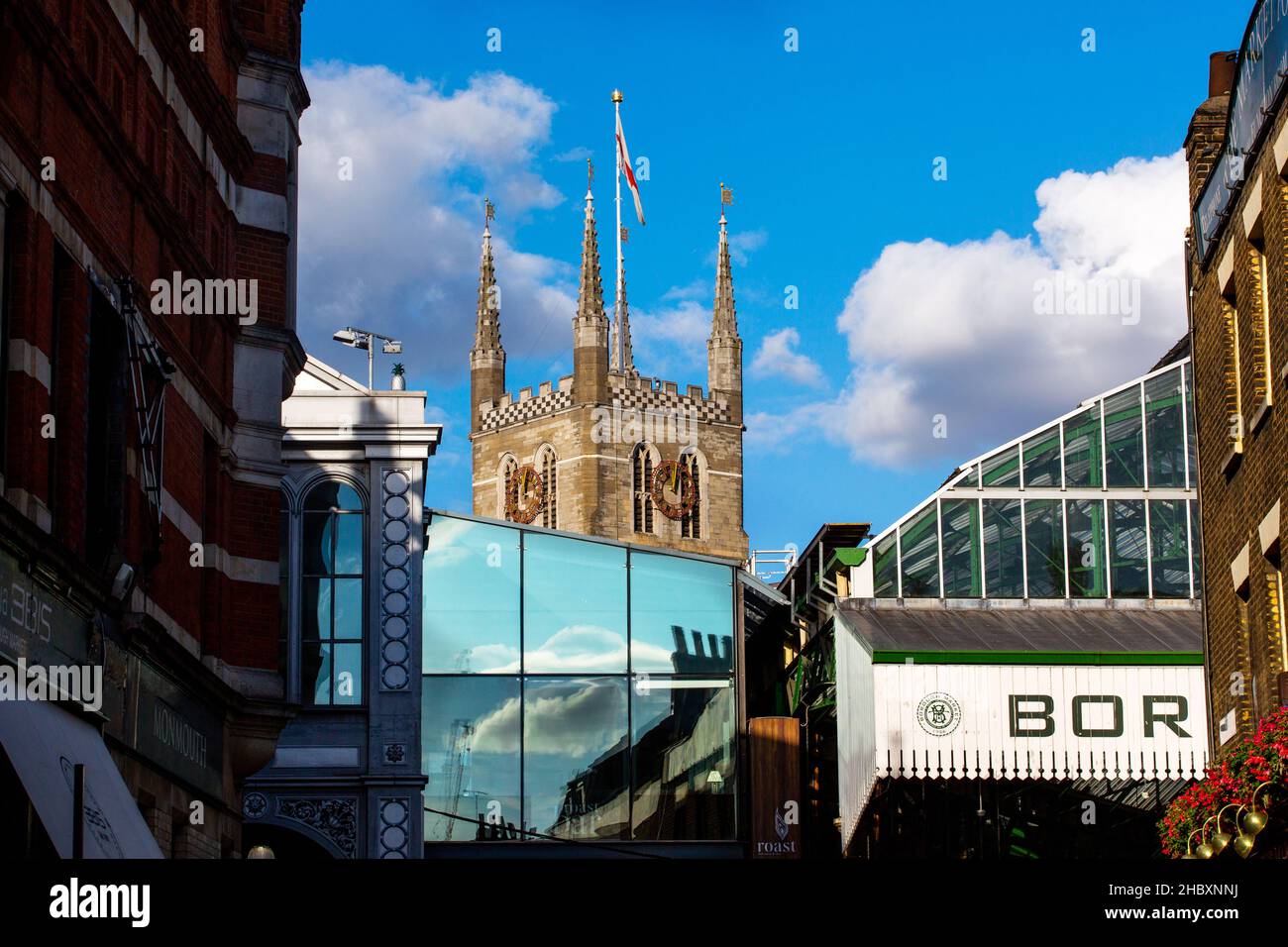 London city centre with glass reflections and blue sky Stock Photo