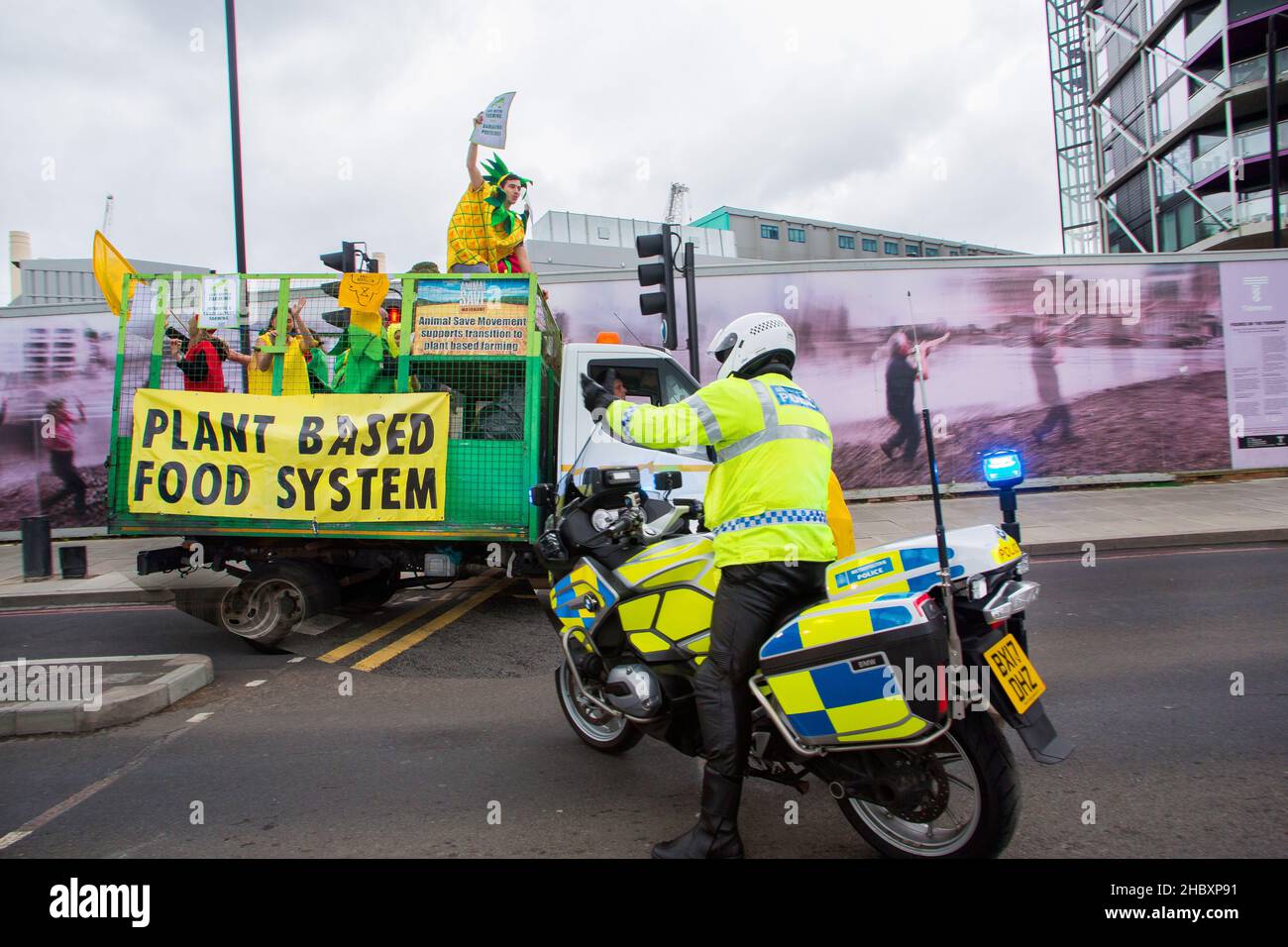 animal rebellion protestors drive through London on veggie truck in support of plant based British farming London 2020 Stock Photo