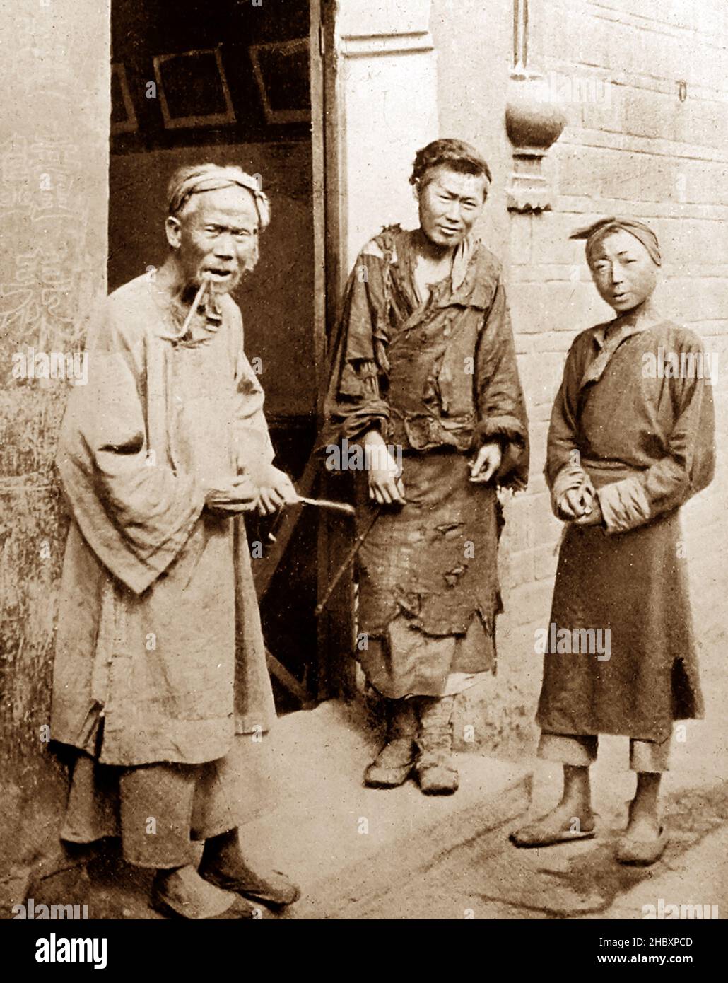 Street beggars, China, early 1900s Stock Photo