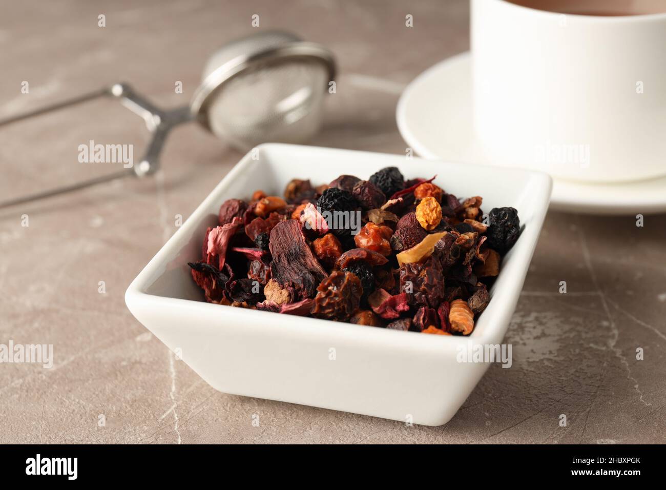 Concept of cooking tea with different types of tea on light textured ...