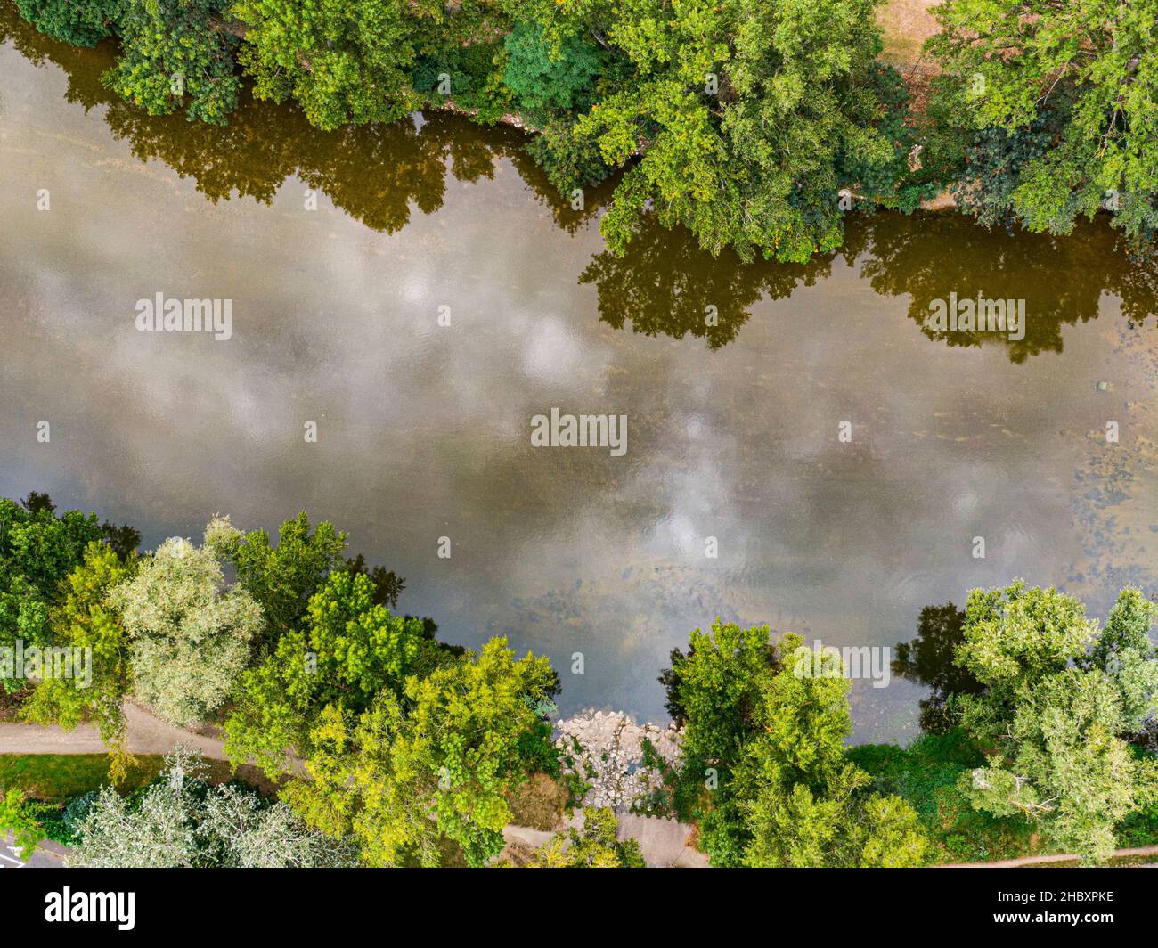 The Loire rivers next Tours seen from above, summer view with clouds reflections on the water and green foliages, Loire valley, France Stock Photo