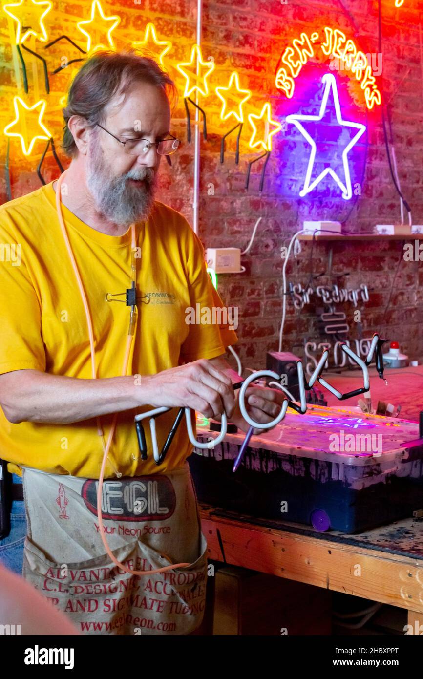 craftsman making neon signs from glass tubes Stock Photo Alamy