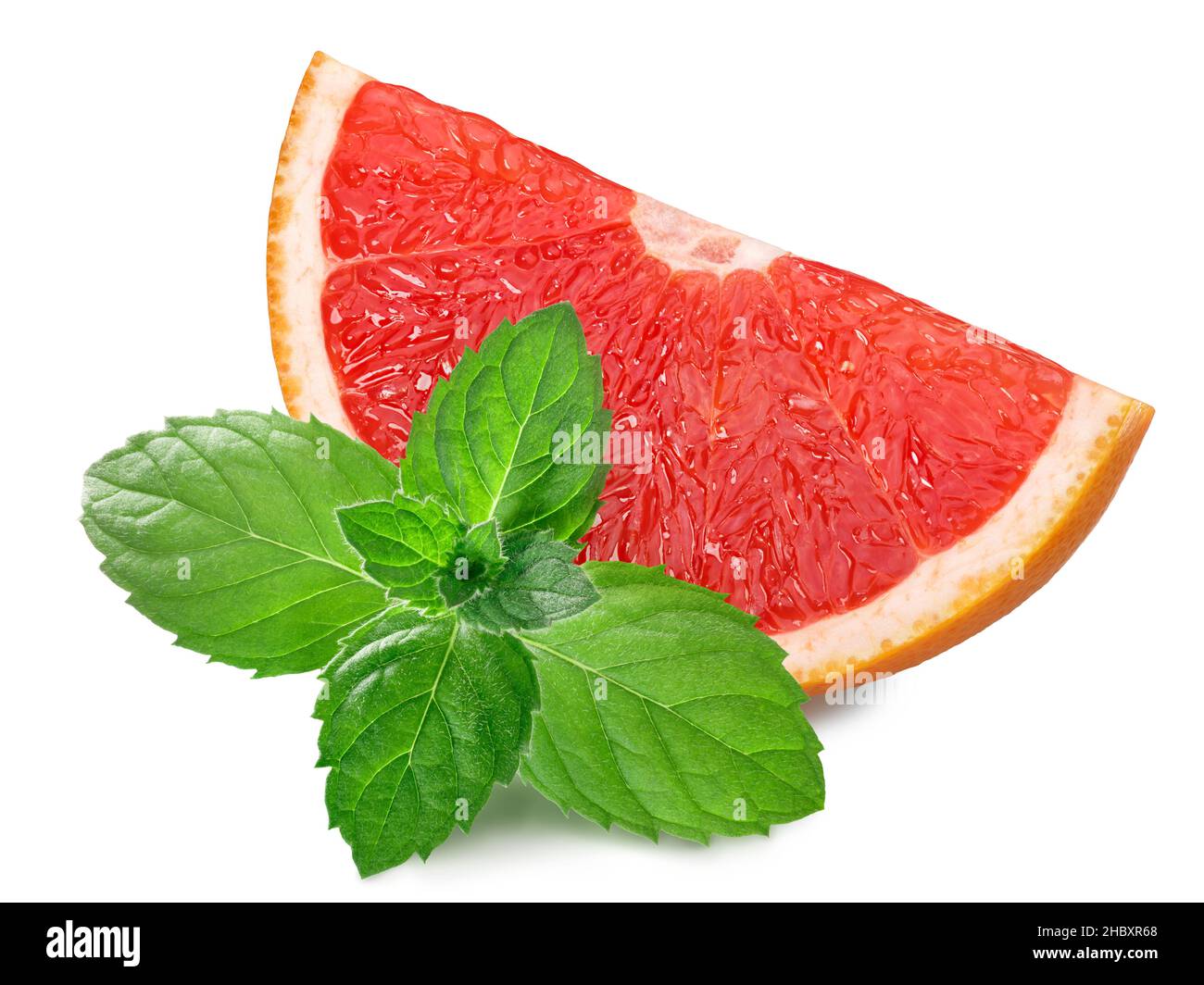 Grapefruit slice with mint leaves isolated Stock Photo