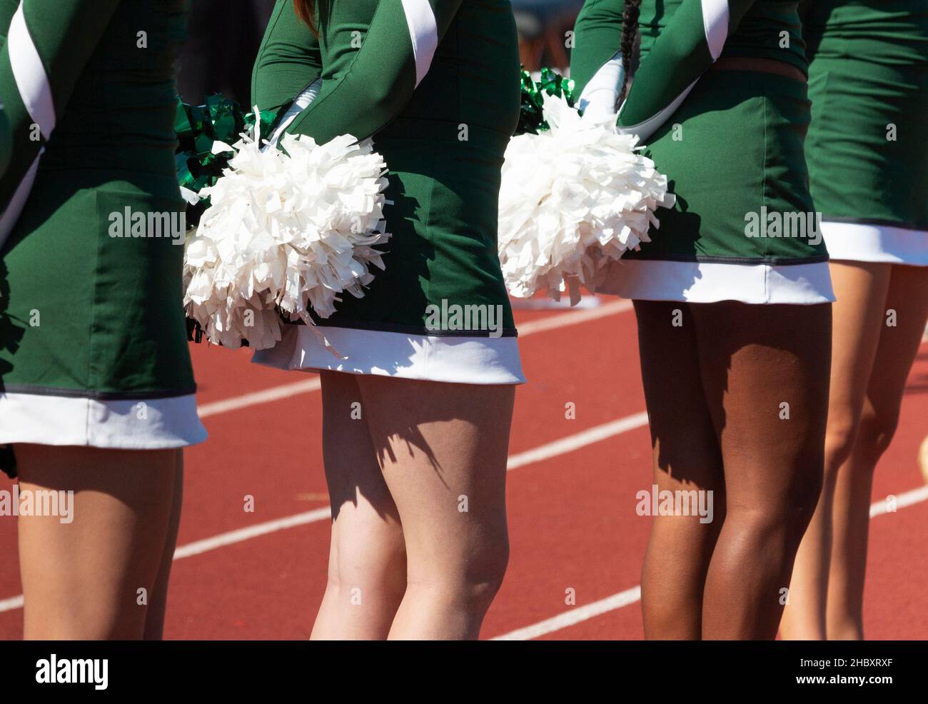 Cheerleaders with pom poms hires stock photography and images Alamy