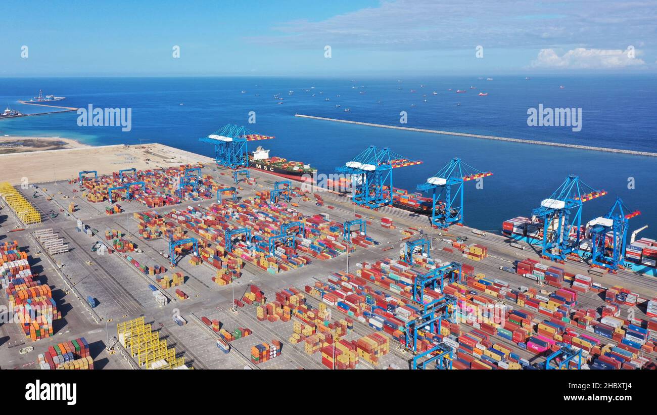 An aerial shot of the Tema seaport in Ghana under the cloudy skies ...