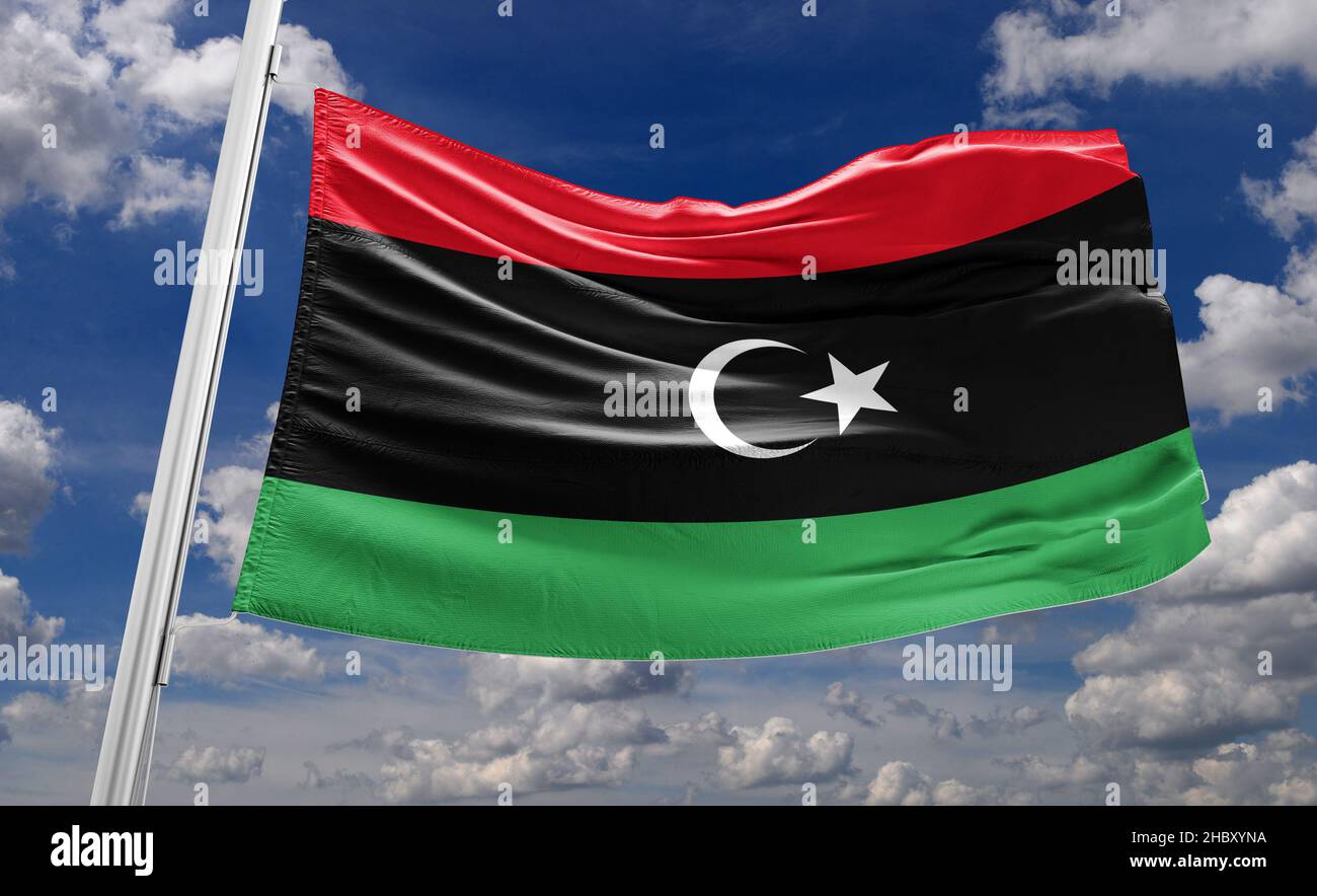 The flag of Libya was originally introduced in 1951, following the creation of the Kingdom of Libya. Stock Photo