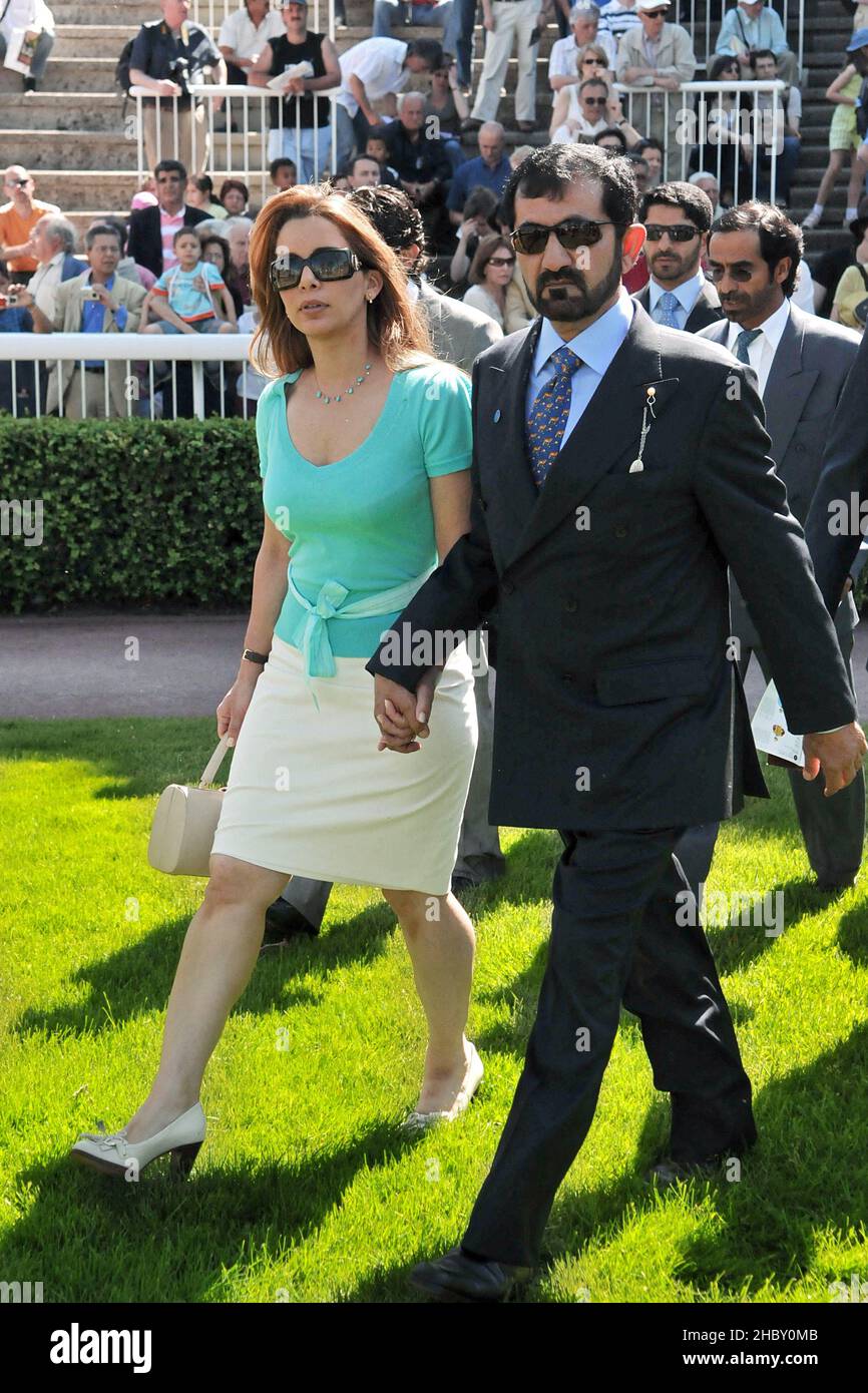 File photo dated May 11, 2008 of Jordan's Princess Haya and her husband, Dubai's ruler, Sheikh Mohammed Bin Rashed Al Maktoum attend colts race, known as 'Poule d'Essai des Poulains' at Longchamp racecourse in Paris, France. The UK's High Court on Tuesday December 21, 2021, awarded a lump sum settlement of £ 251.5m to Princess Haya Bint Al-Hussain, the 47-year-old daughter of Jordan's former King Hussein. She is the youngest of six wives of Sheikh Mohammed Bin Rashid Al-Maktoum, the multi-billionaire ruler of Dubai, prime minister of the UAE and influential horse-racing owner. The judgment pro Stock Photo