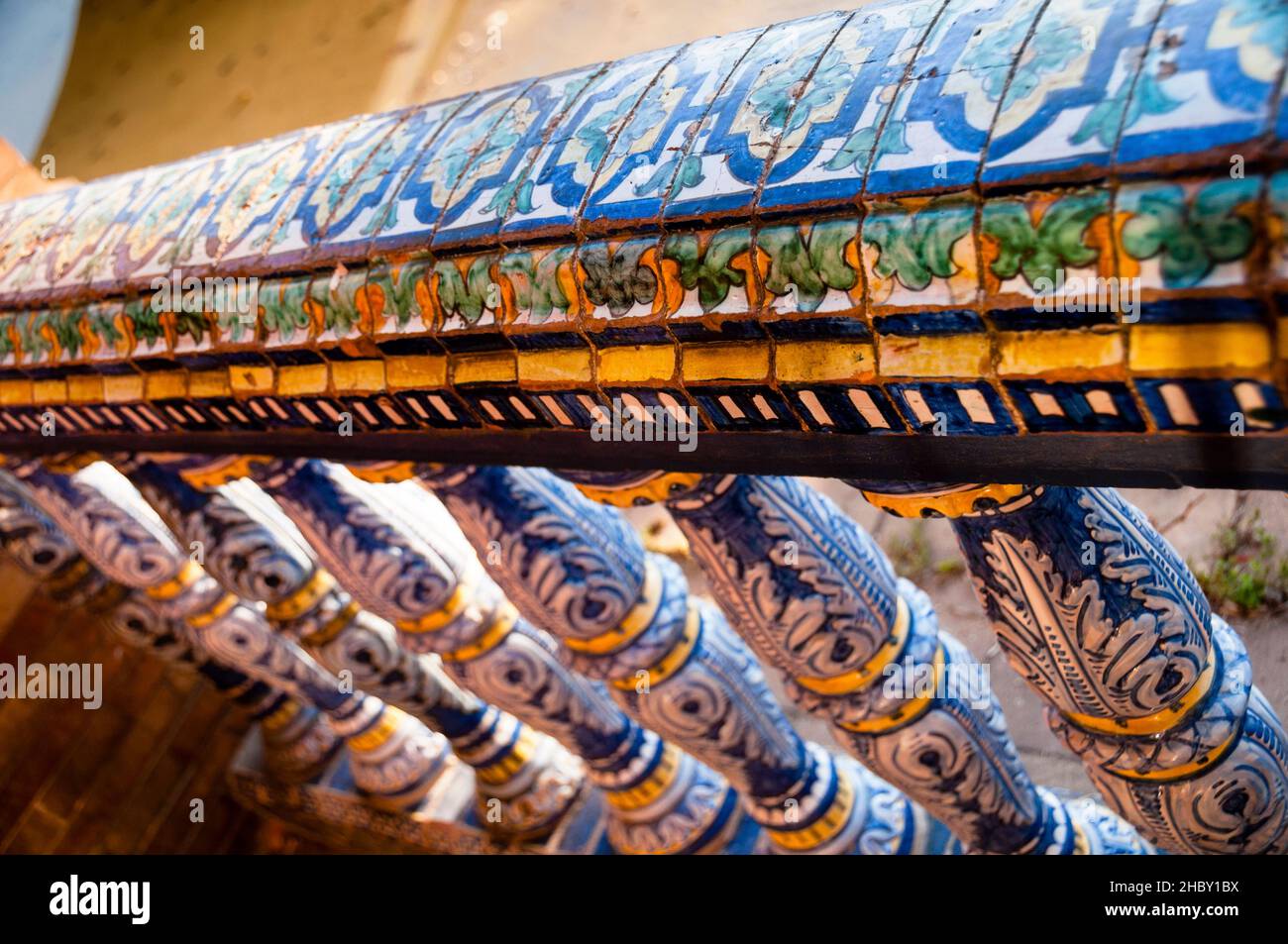 Colorful Spanish tile handrail and bannisters at Plaza de Seville in