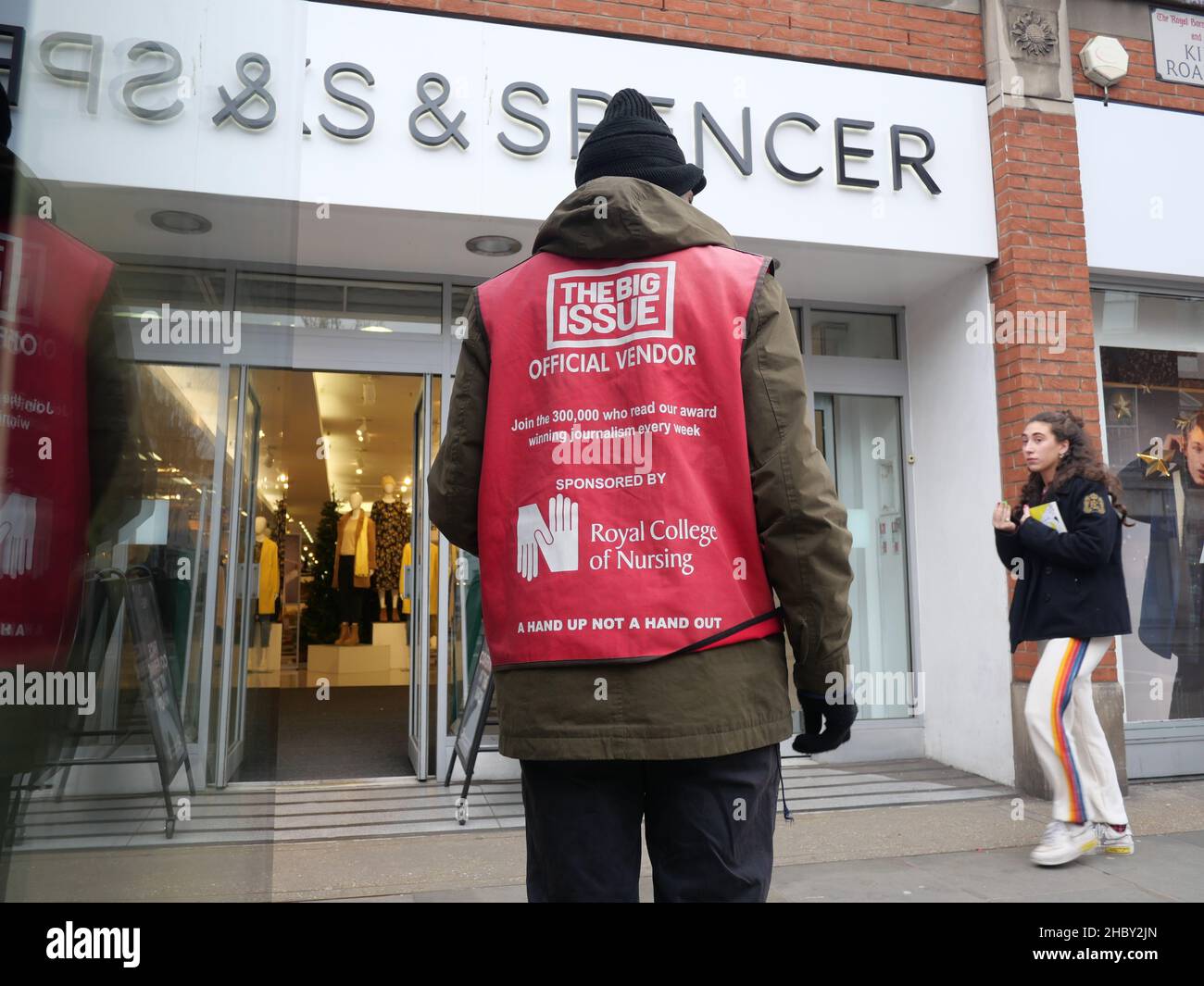 London.UK. December 22nd 2021.Big Issue sellers plead for support as streets empty ahead of Christmas. Credit: Brian Minkoff/Alamy Live News Stock Photo