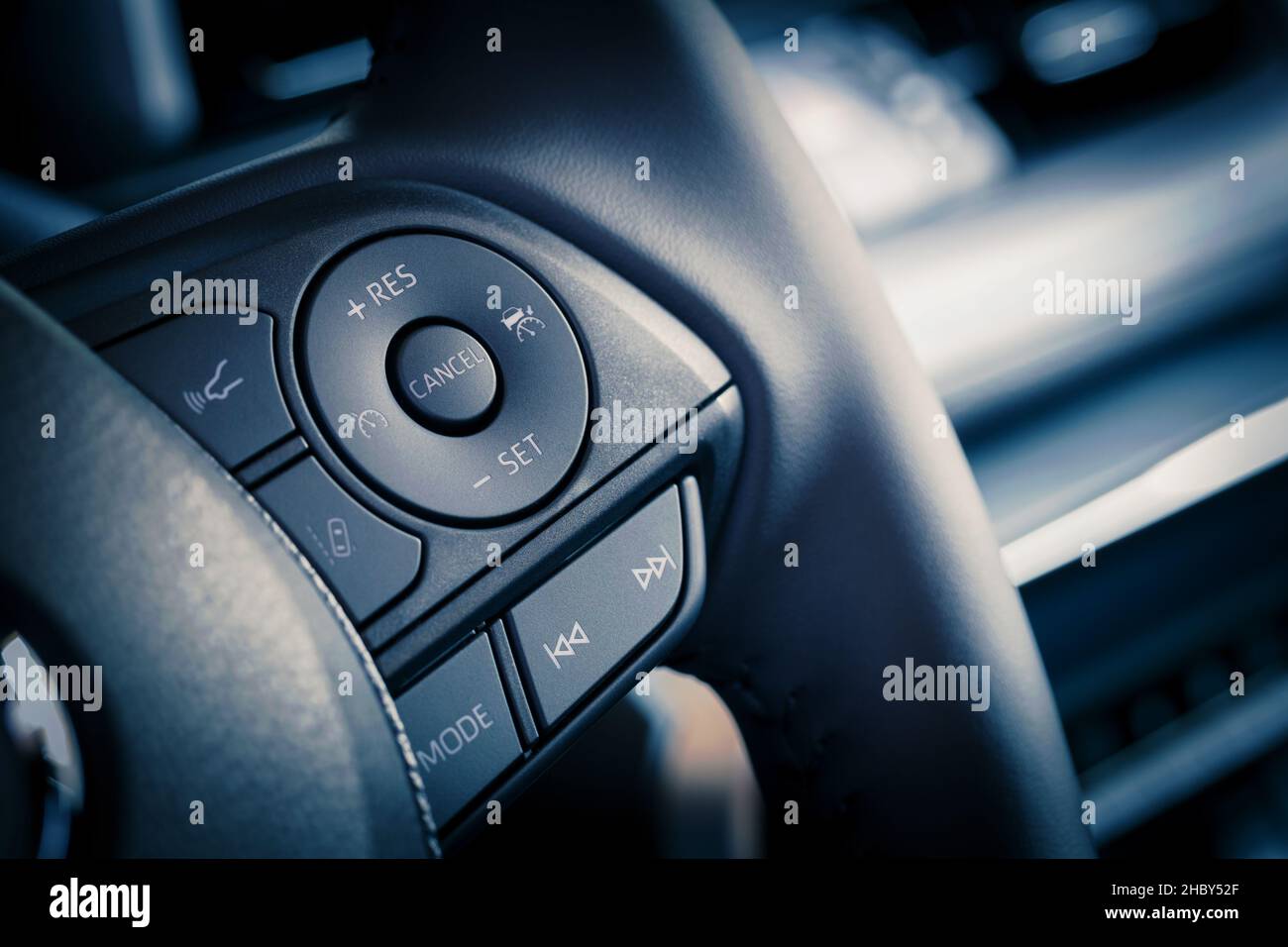 special cruise control controls on the steering wheel Stock Photo Alamy
