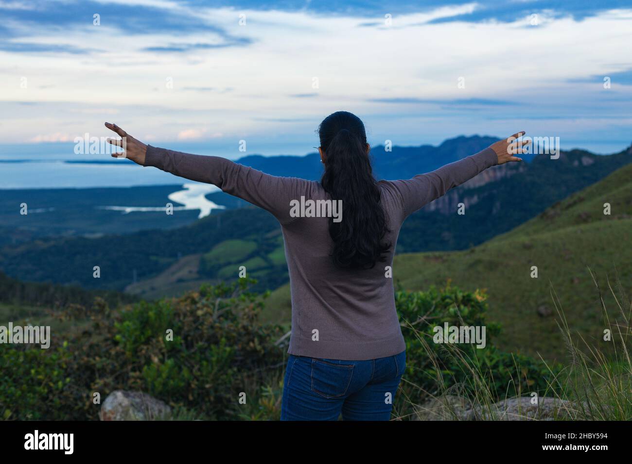 Rear view woman arms hi-res stock photography and images - Alamy