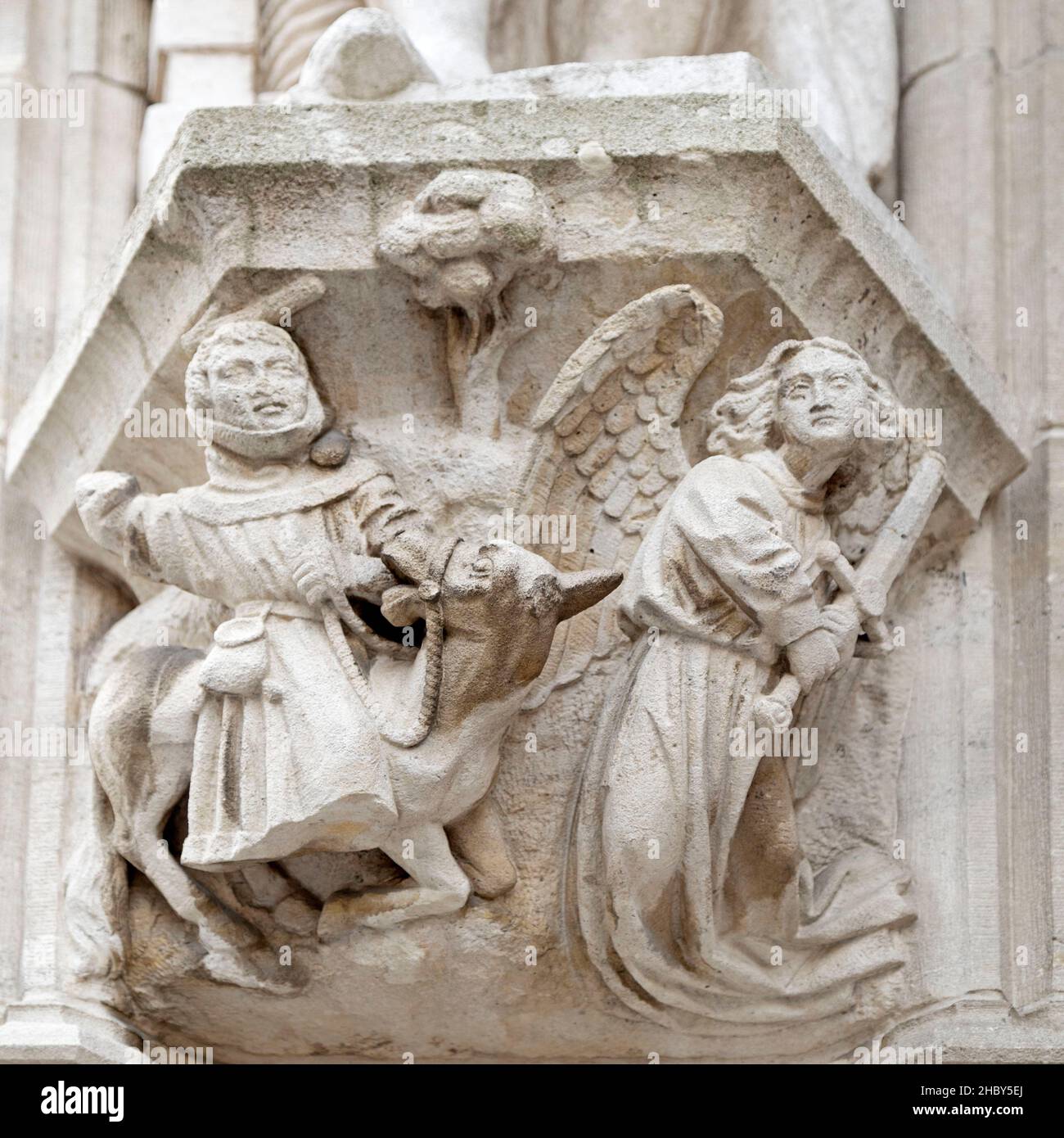 Biblical sculpture on the facade of the city hall (stadhuis) in Leuven, Belgium. The Gothic building dates from the 15th century. Stock Photo