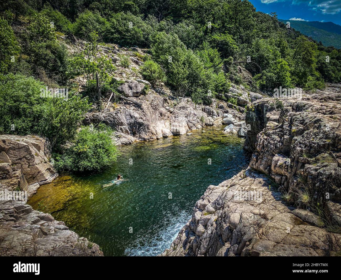 Wild swimming in Chassezac river in Lozere district in France Stock Photo