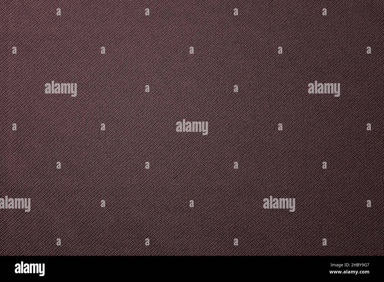 Synthetic nylon reddish fabric texture for background Stock Photo
