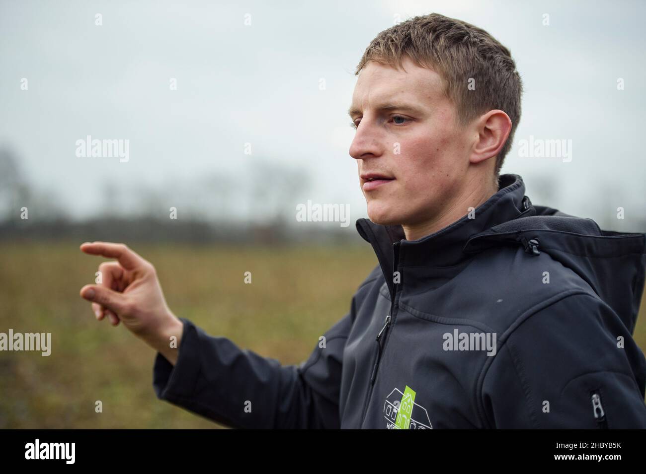 Kropp, Germany. 15th Dec, 2021. Hauke Sierck, farmer, stands on a field of the family-owned farm Hof Fuhlreit. Credit: Gregor Fischer/dpa/Alamy Live News Stock Photo
