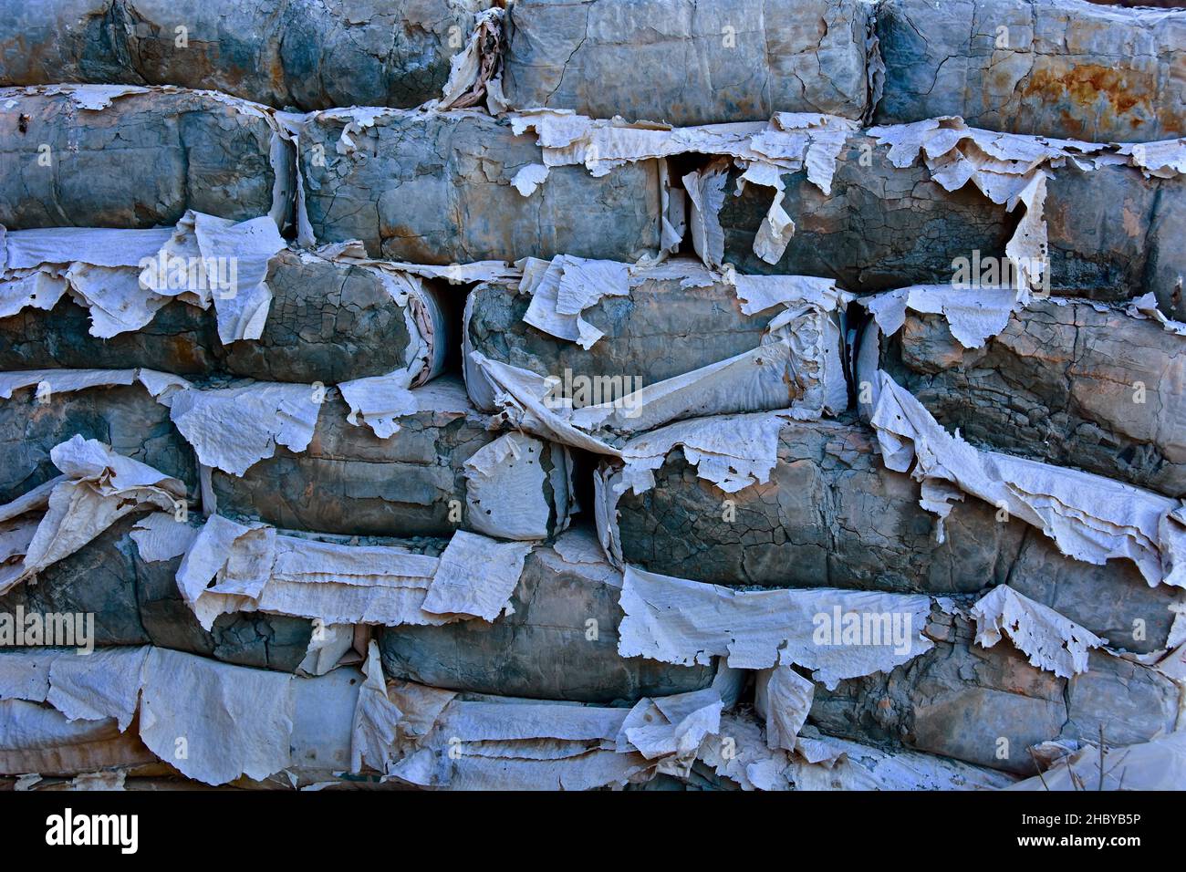 Torn and hardened cement bags, skinned cement in torn bags Stock Photo Alamy