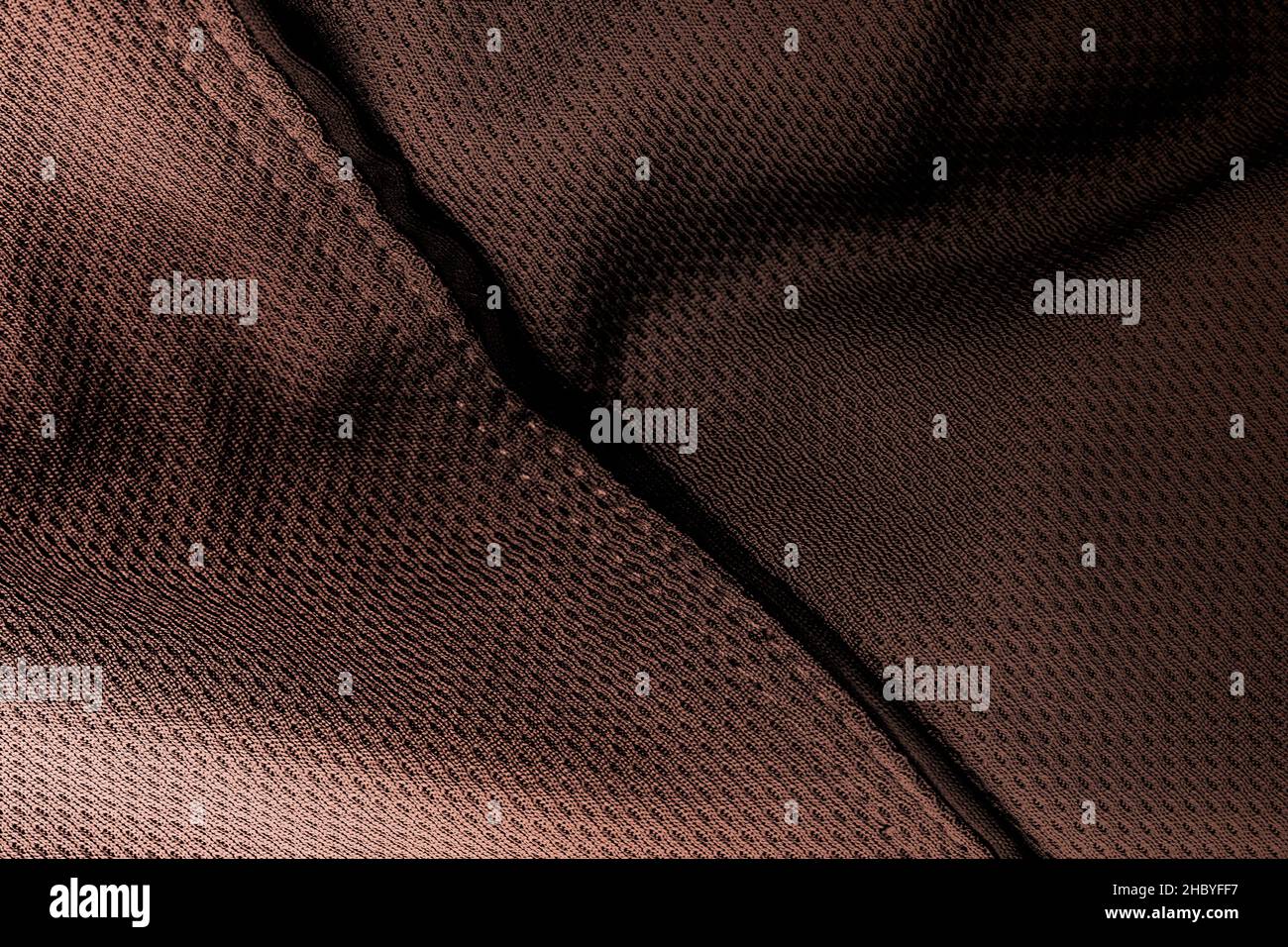 Dark moody woolen fabric texture background with abstract pattern Stock Photo