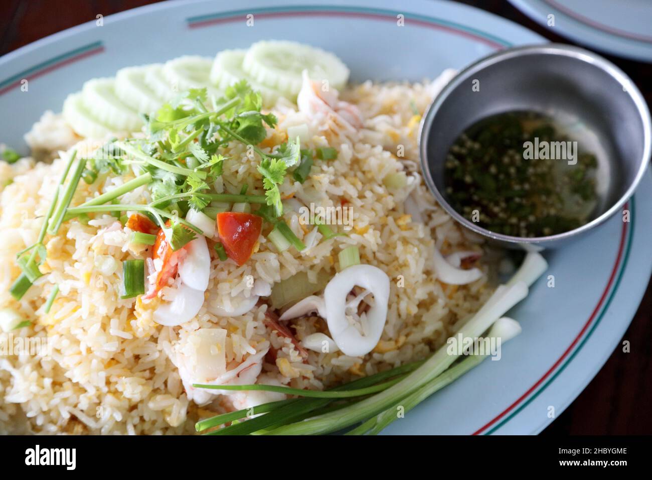 Thai seafood fried rice served with thai fish sauce Stock Photo - Alamy