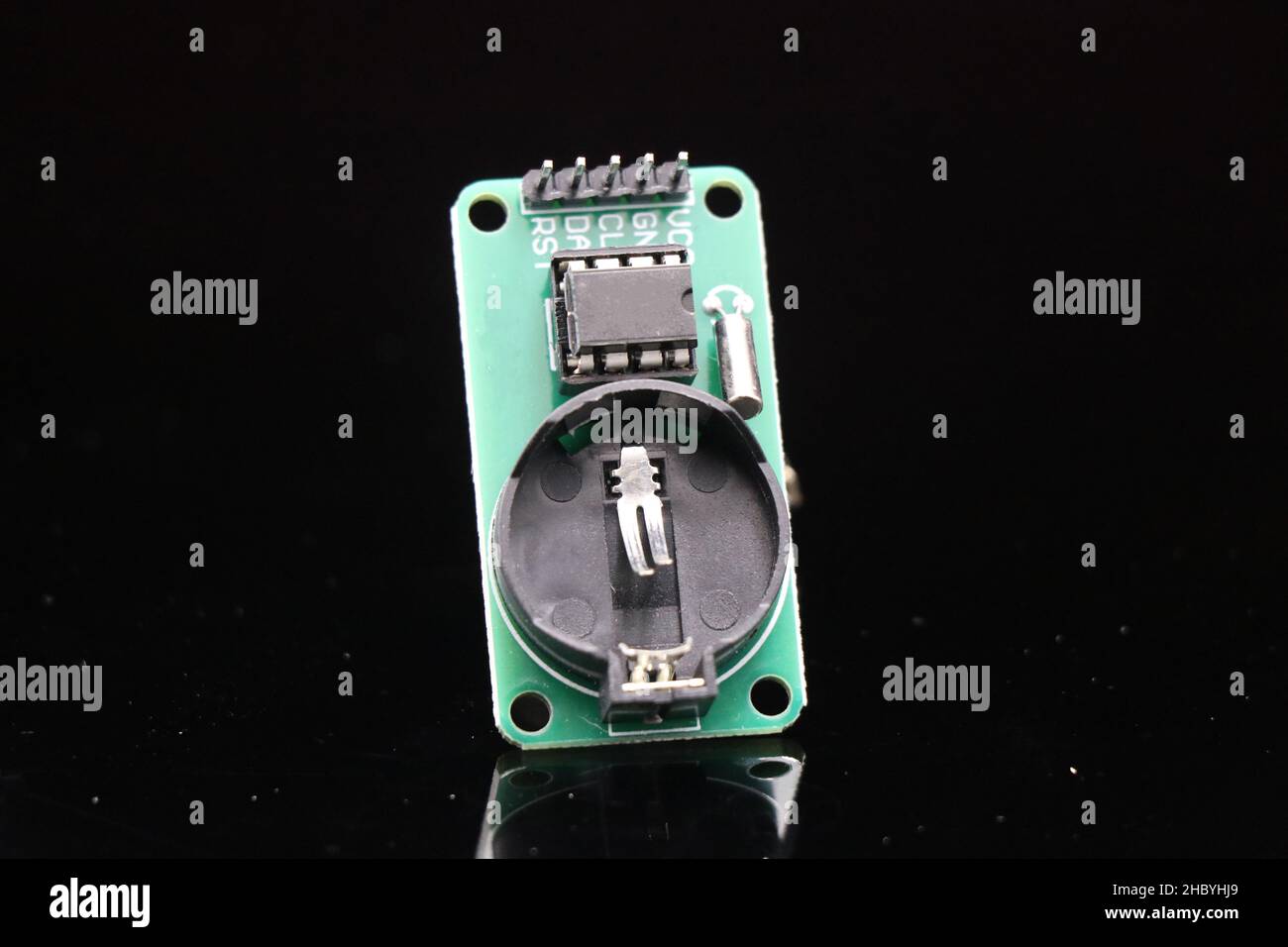 Real time clock module or RTC module for timekeeping used in creative electronic projects isolated on black background Stock Photo